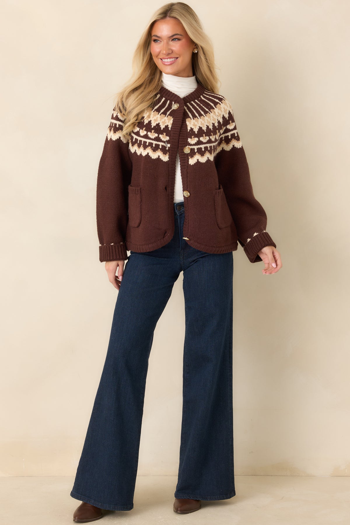 Wide-leg jeans featuring a relaxed fit through the legs, traditional five-pocket styling, belt loops, and a classic button-and-zip fly.