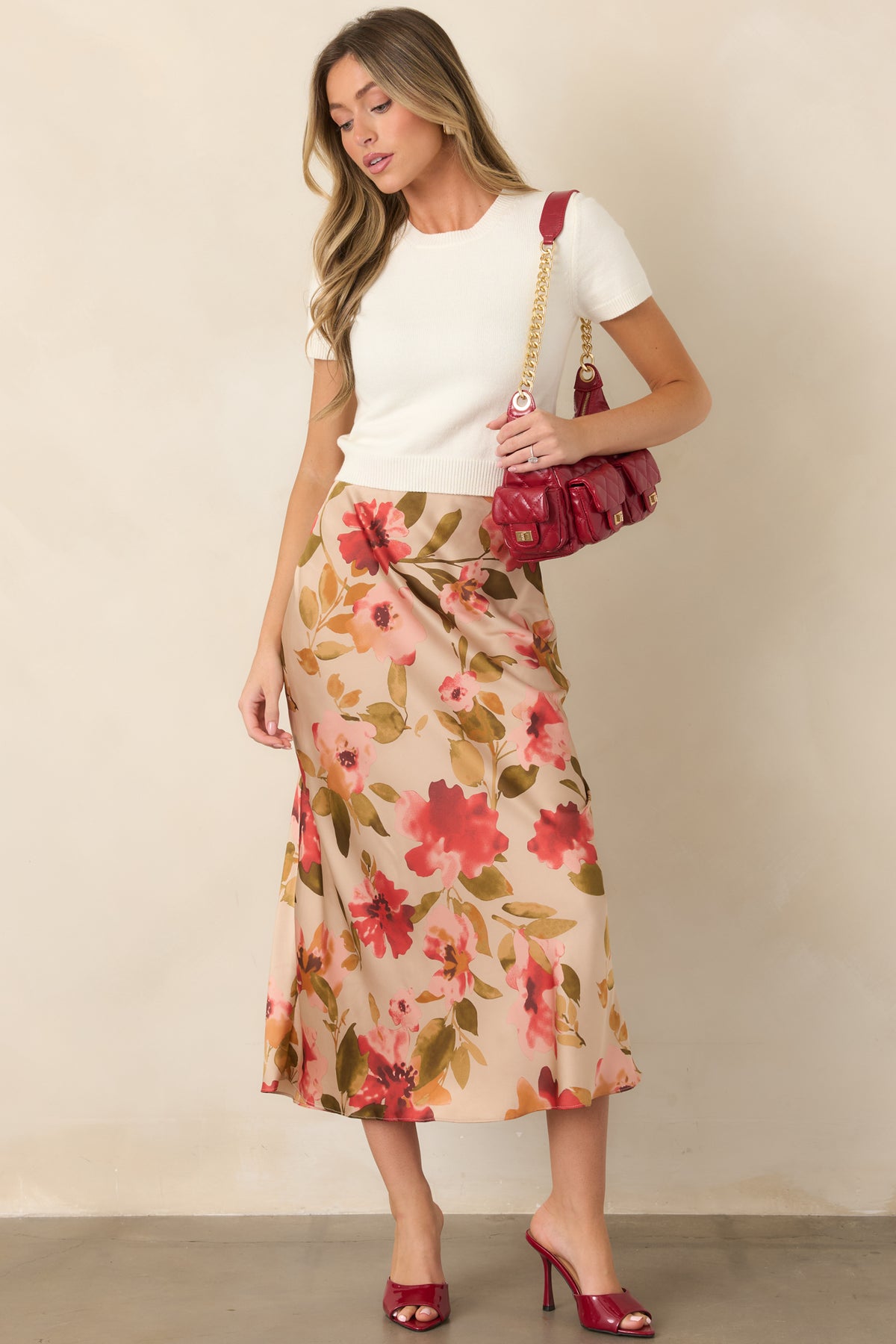 Classic fitted knit top showcasing clean lines and ribbed neckline trim.