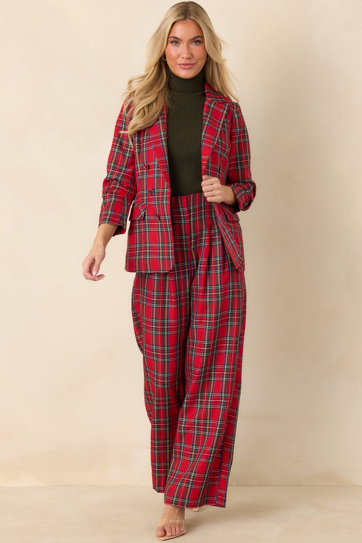 Classic red tartan blazer featuring a tailored silhouette and structured notched lapels.
