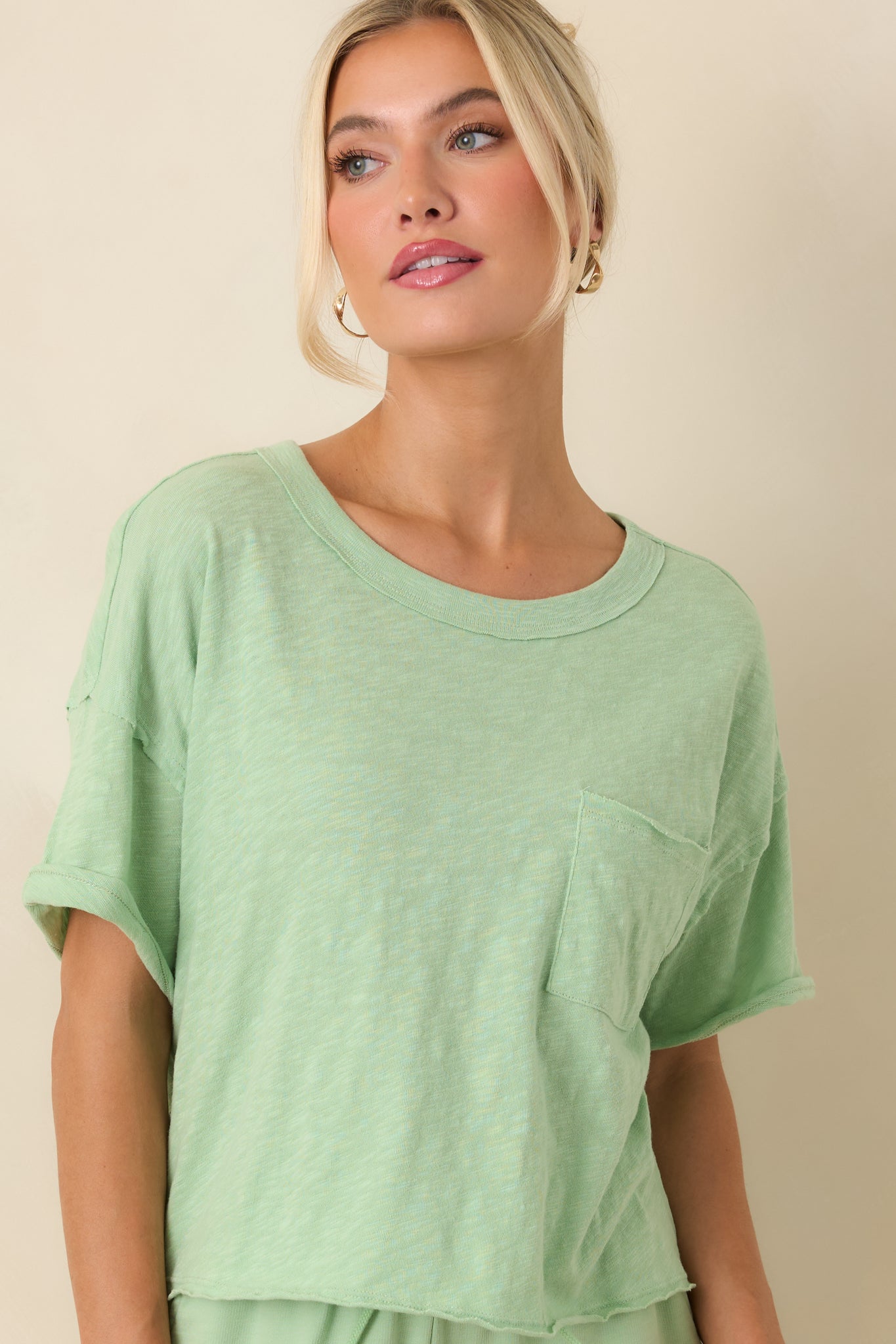 Classic short sleeve tee showcasing clean neckline and easy silhouette.