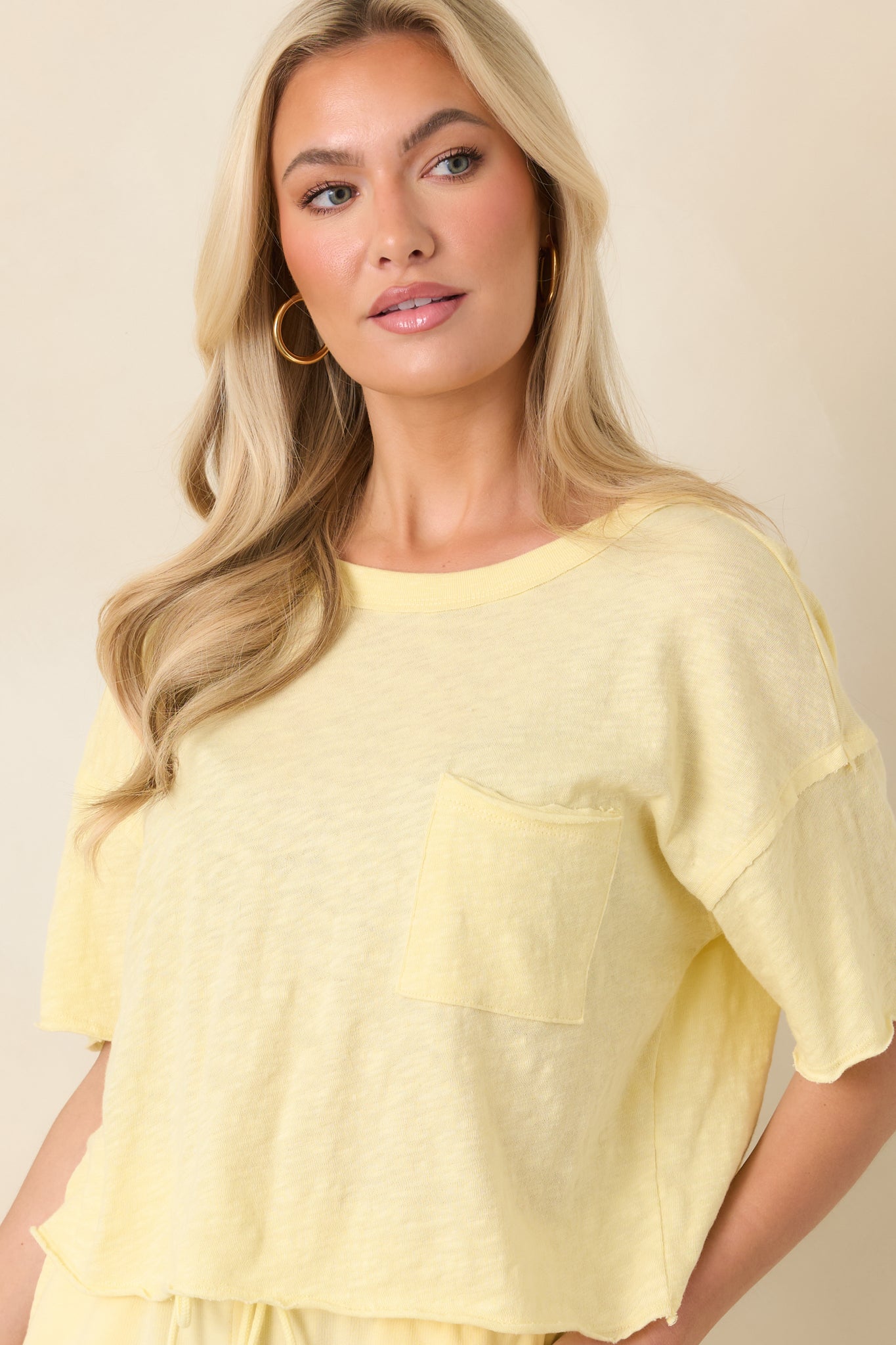 Closer angle emphasizing the slightly cropped hem and relaxed, modern silhouette.