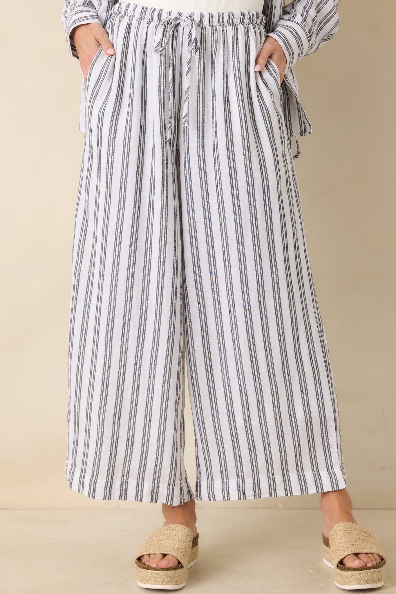 Close cropped angle highlighting black and white stripe pattern and lightweight fabric.