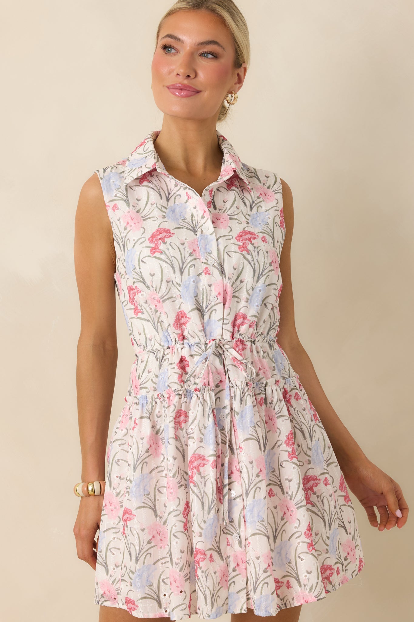 Close detail of textured eyelet embroidery and lightweight lined construction.