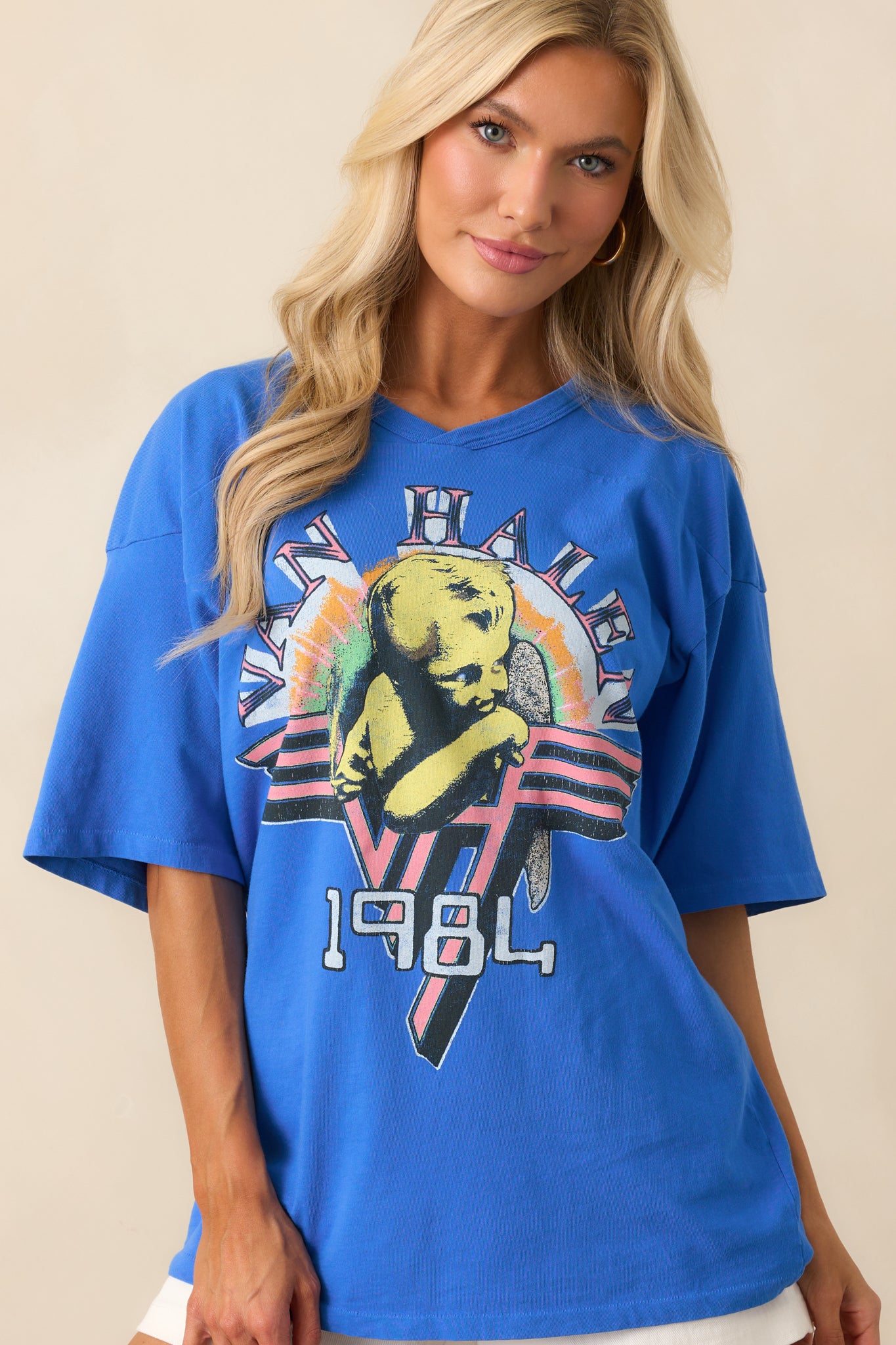 Close-up of the lower half of the shirt emphasizing the hemline and fabric texture.