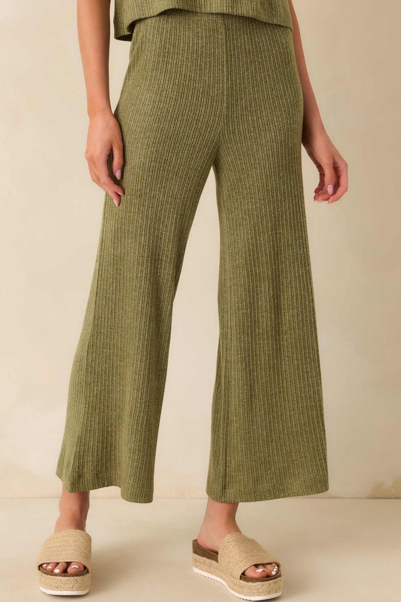 Close-up of the fabric and side seam along the wide leg, showcasing the subtle ribbed pattern.