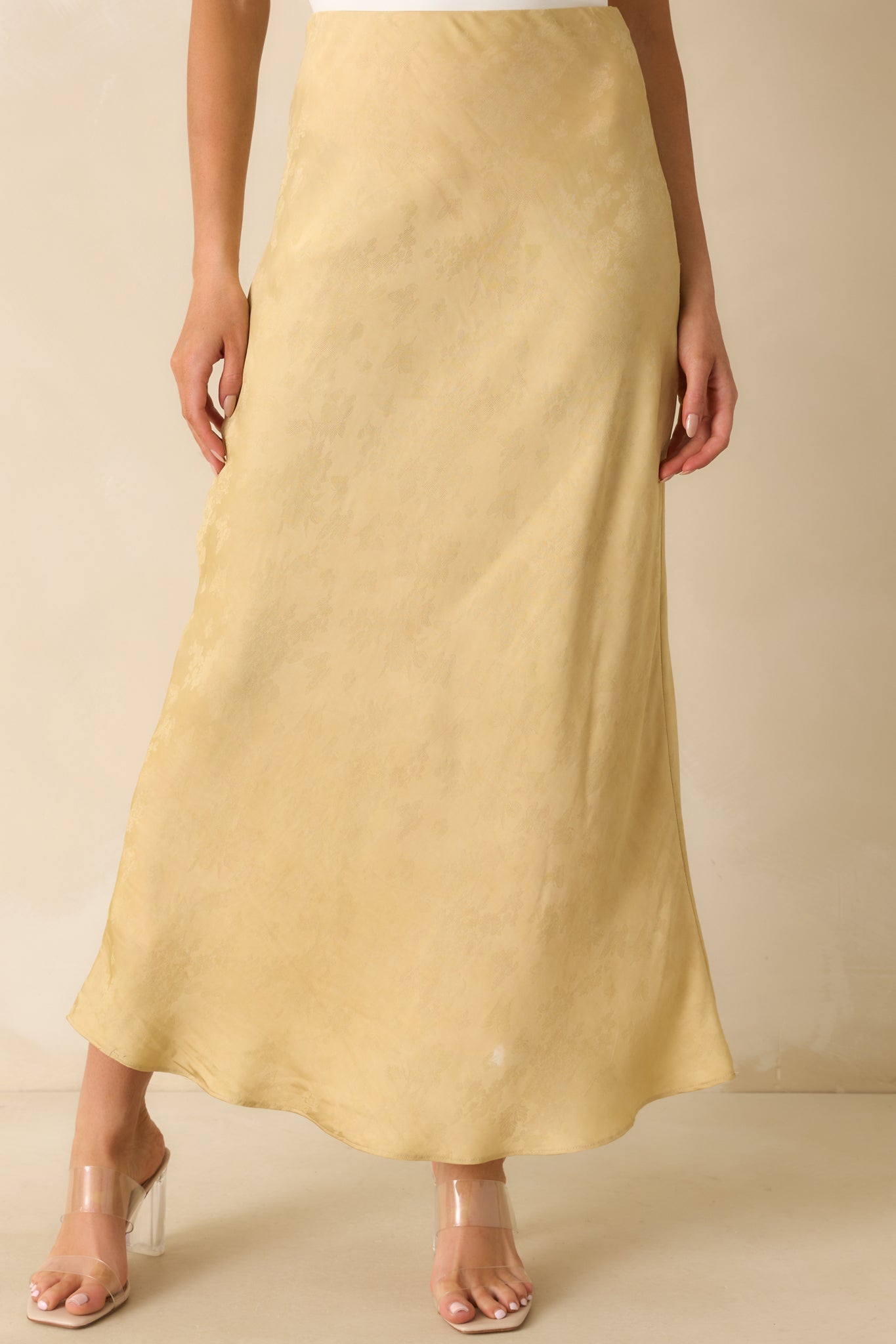 Close-up showing the high-rise waistband and detailed jacquard floral pattern.