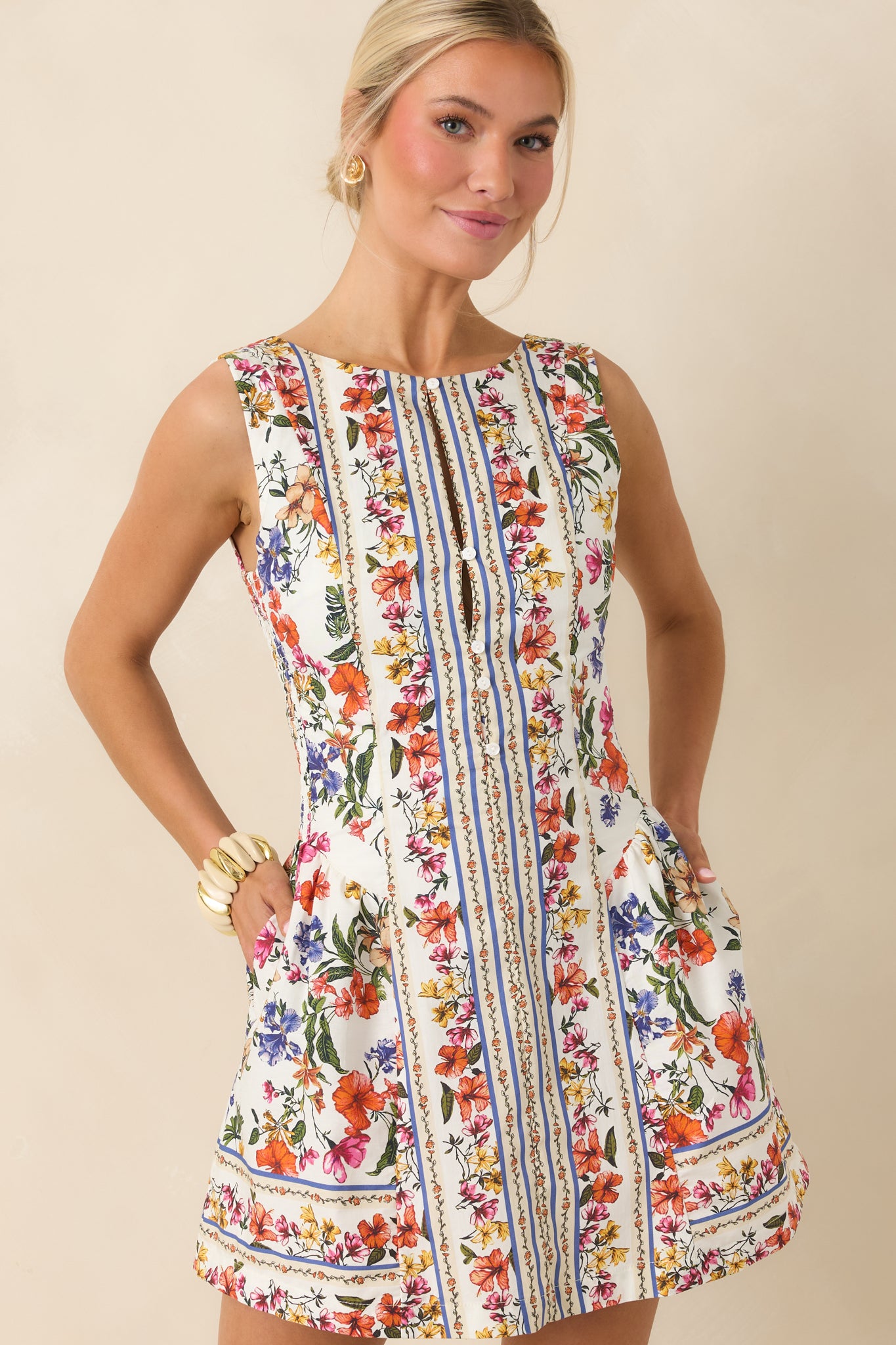 Close-up of breathable cotton fabric with soft floral and stripe design.