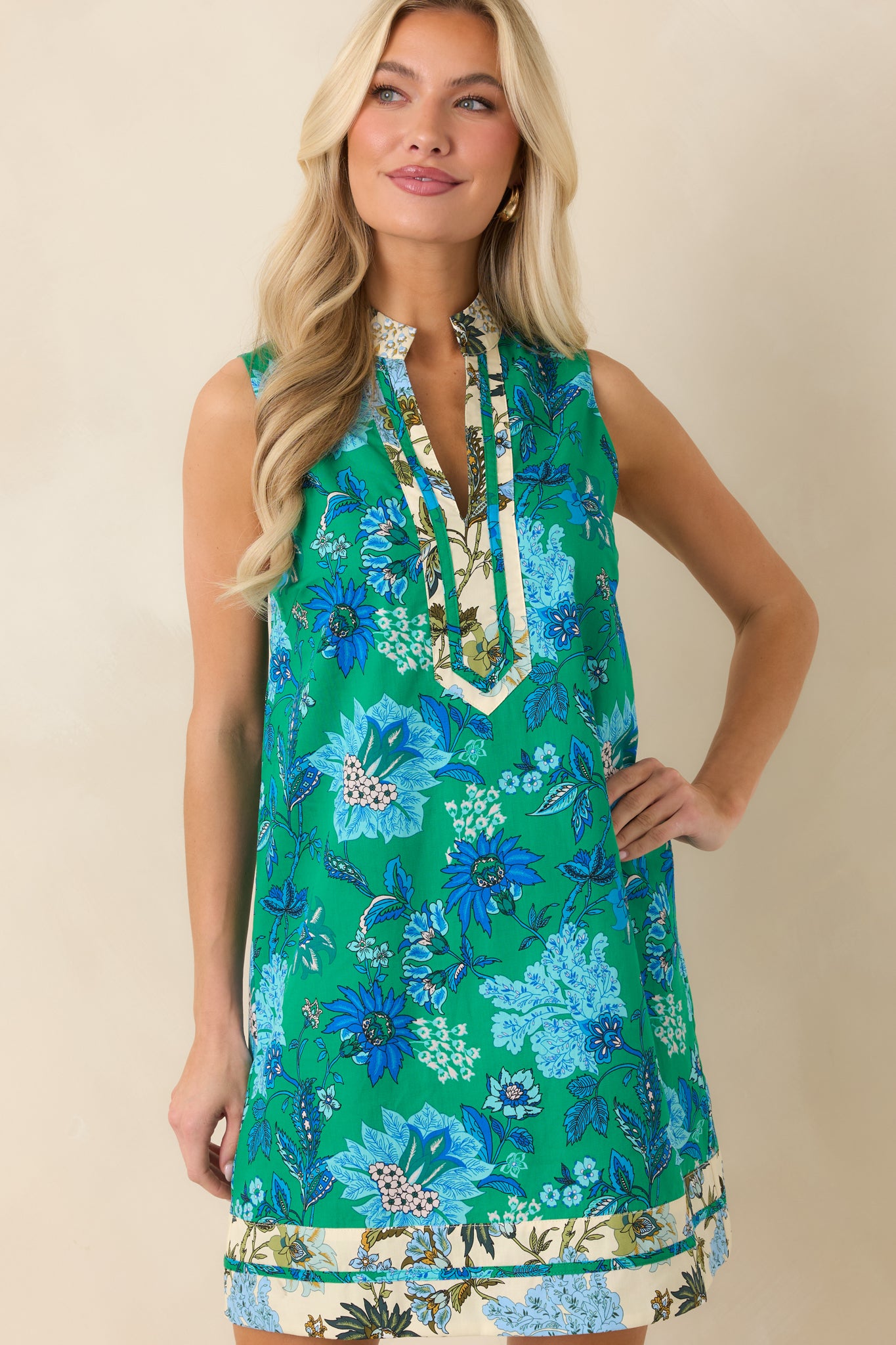 Close-up of lightweight cotton texture with floral and border detailing.