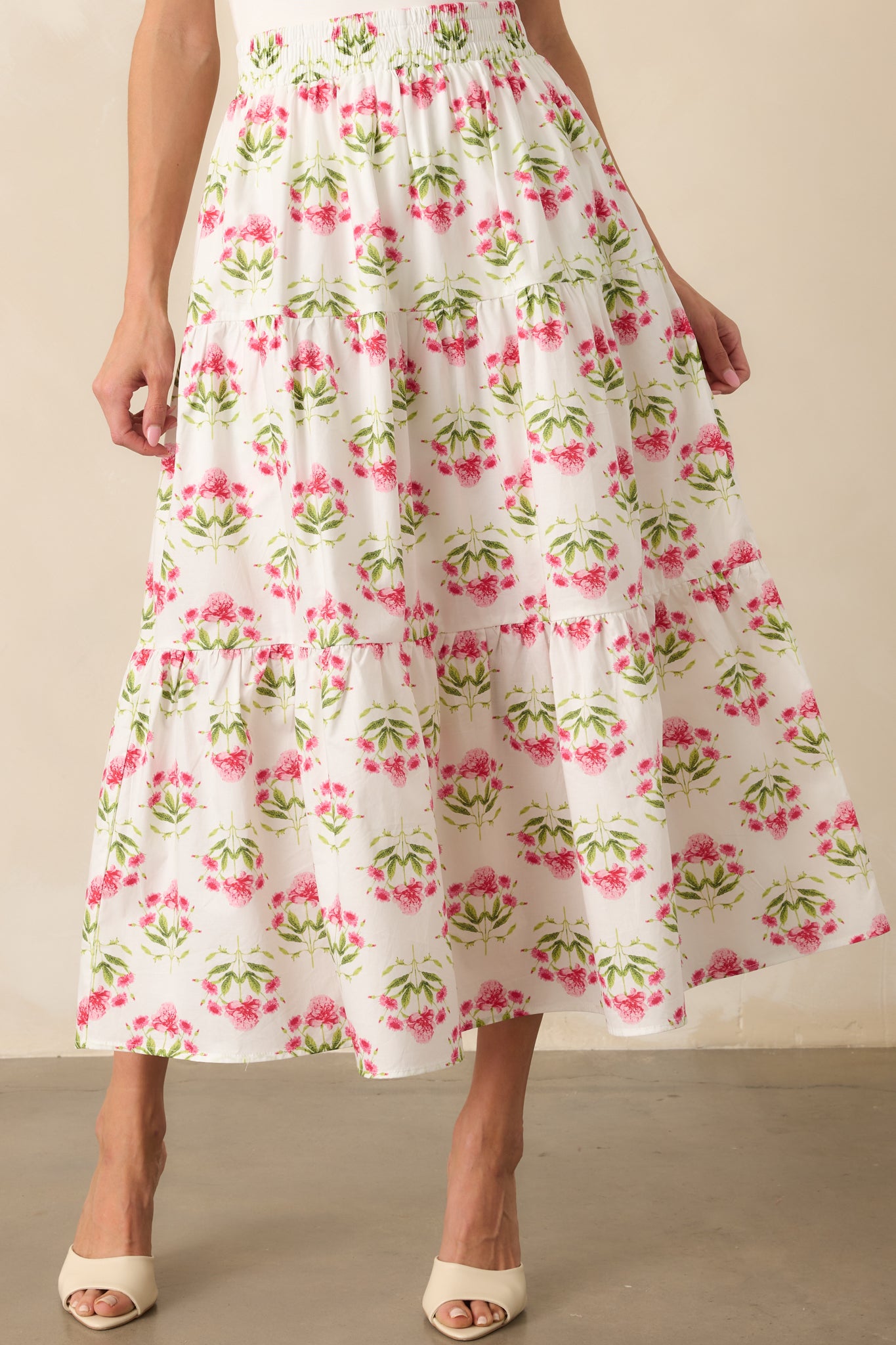 Close-up of the tiered panels on the skirt, emphasizing the soft gathers and movement in the fabric.