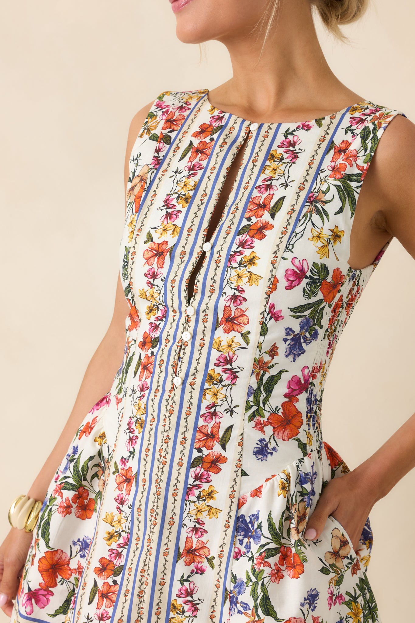 Close-up of vertical paneling and subtle seaming adding structure to mini dress.