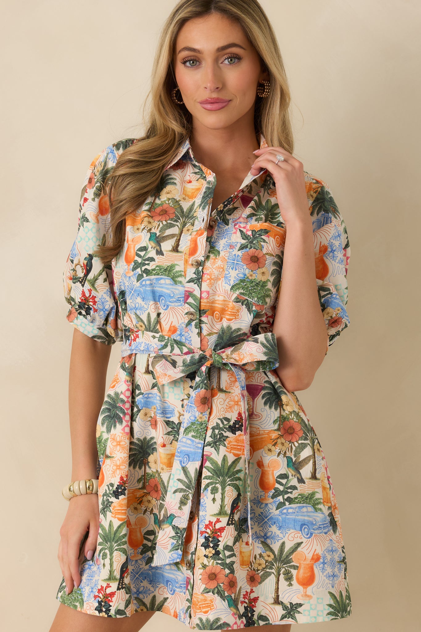 Close view of the smooth, breathable fabric highlighting the tailored shirt dress construction.