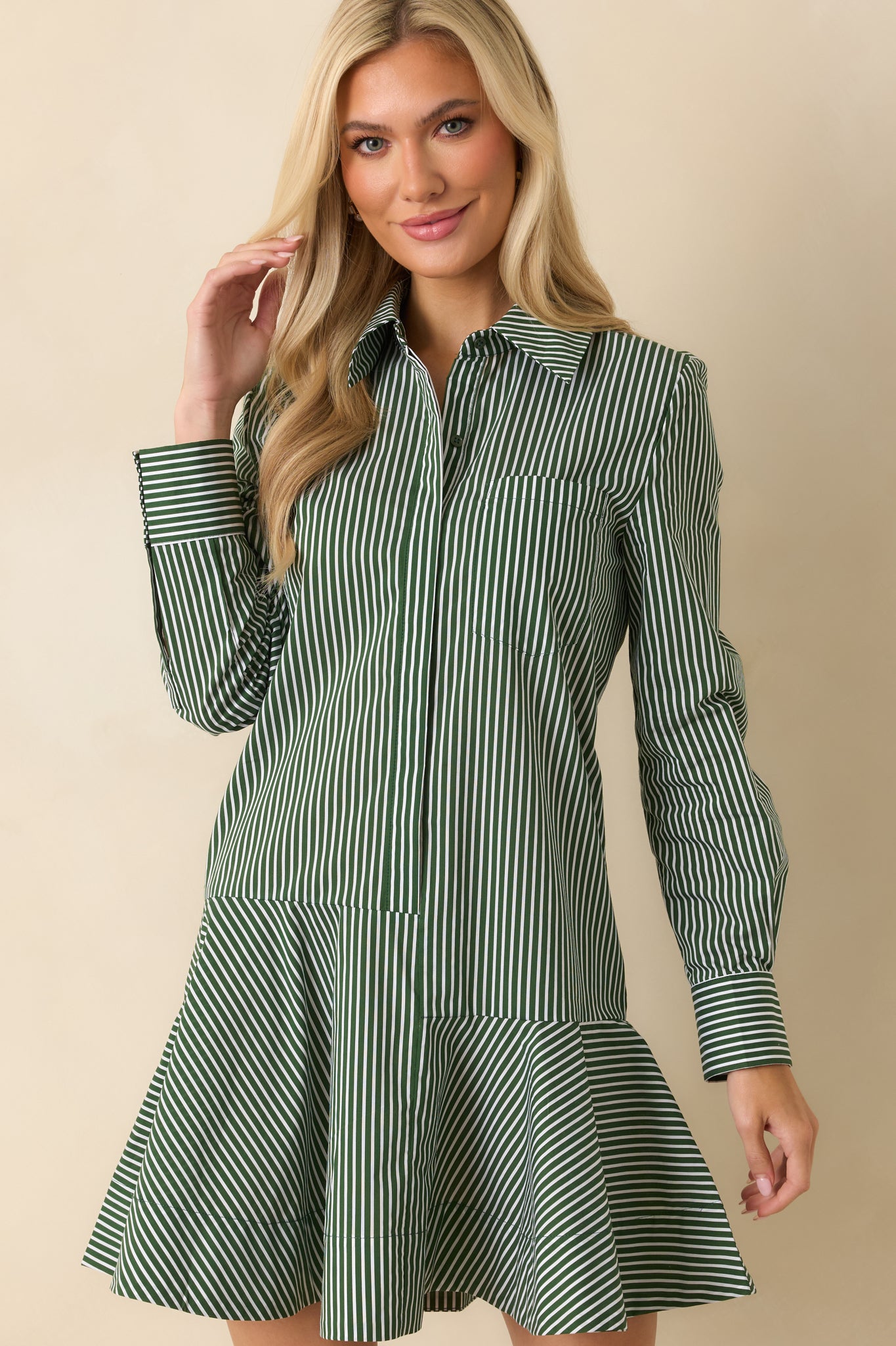 Close view of the olive stripe pattern showcasing the refined woven fabric and sharp lines.