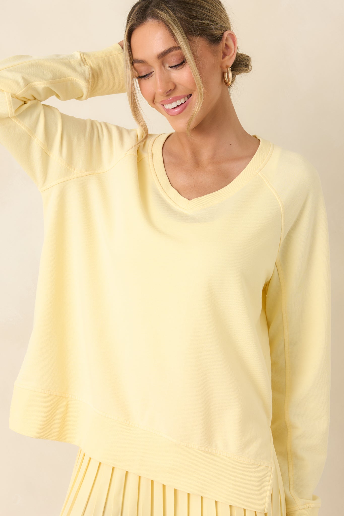 Close view of ribbed cuff adding gentle structure to long sleeve.