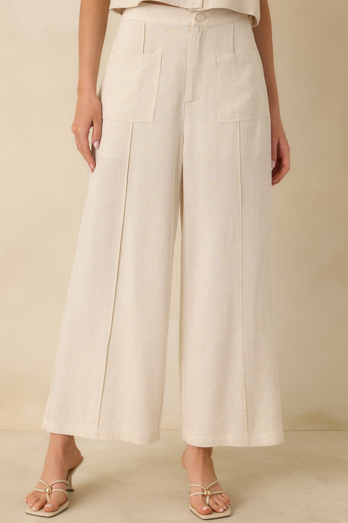 Closer view showing the relaxed leg drape and smooth linen-blend construction.