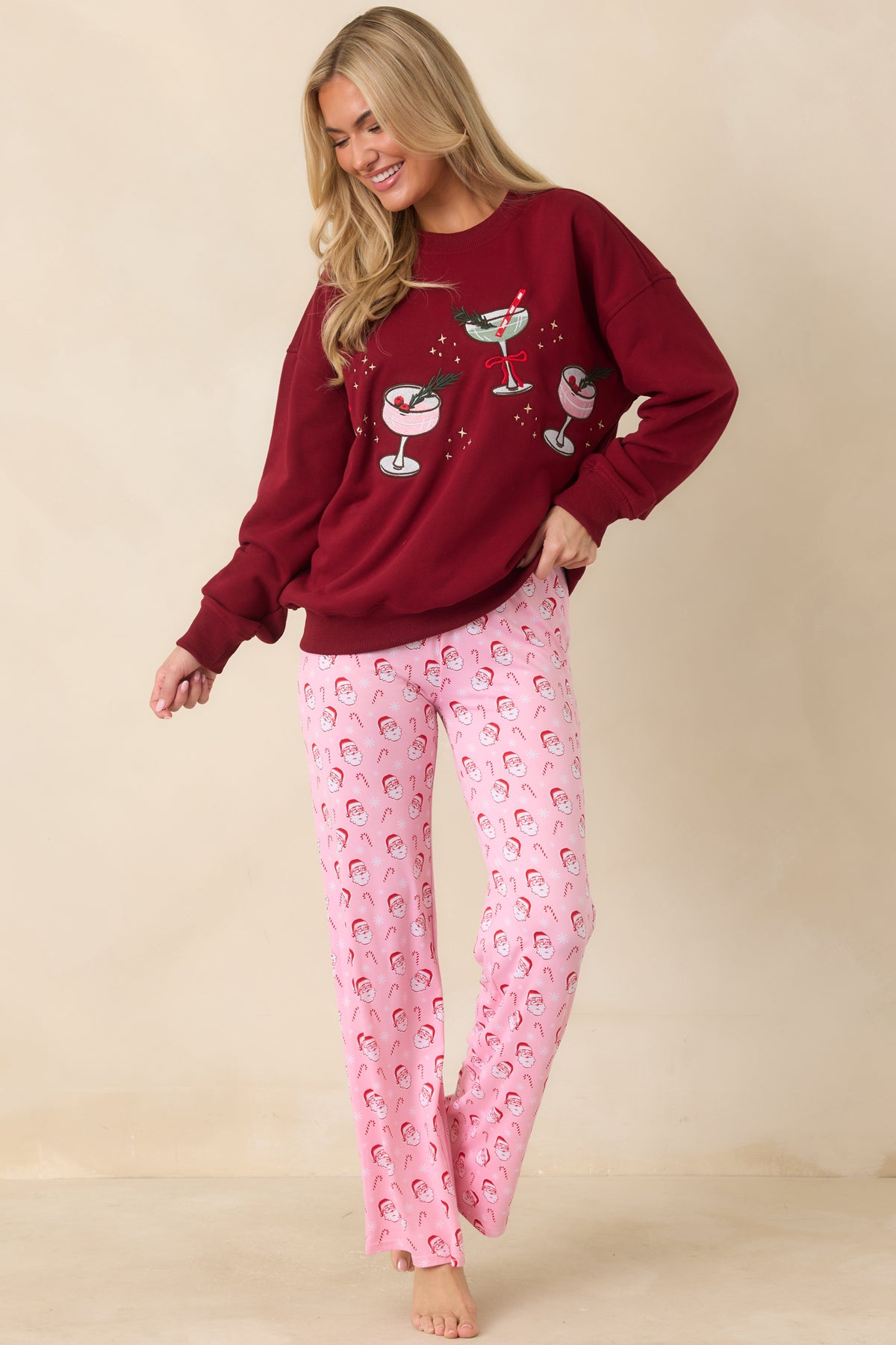 Cotton-blend pullover with colorful cocktail glass embroidery and scattered gold stars across the front.