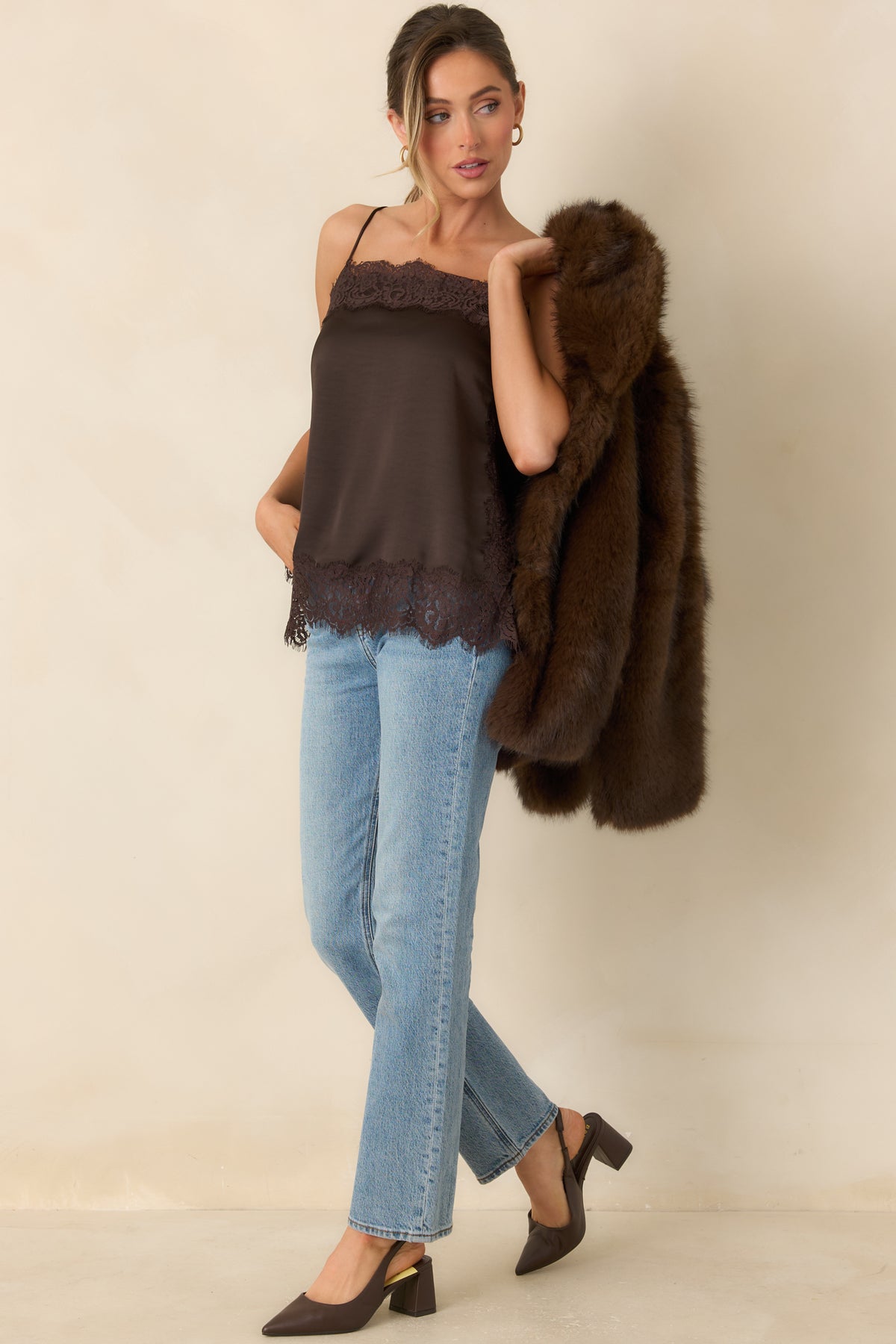 Vintage-inspired cocoa satin camisole with black lace accents along the neckline and sides.