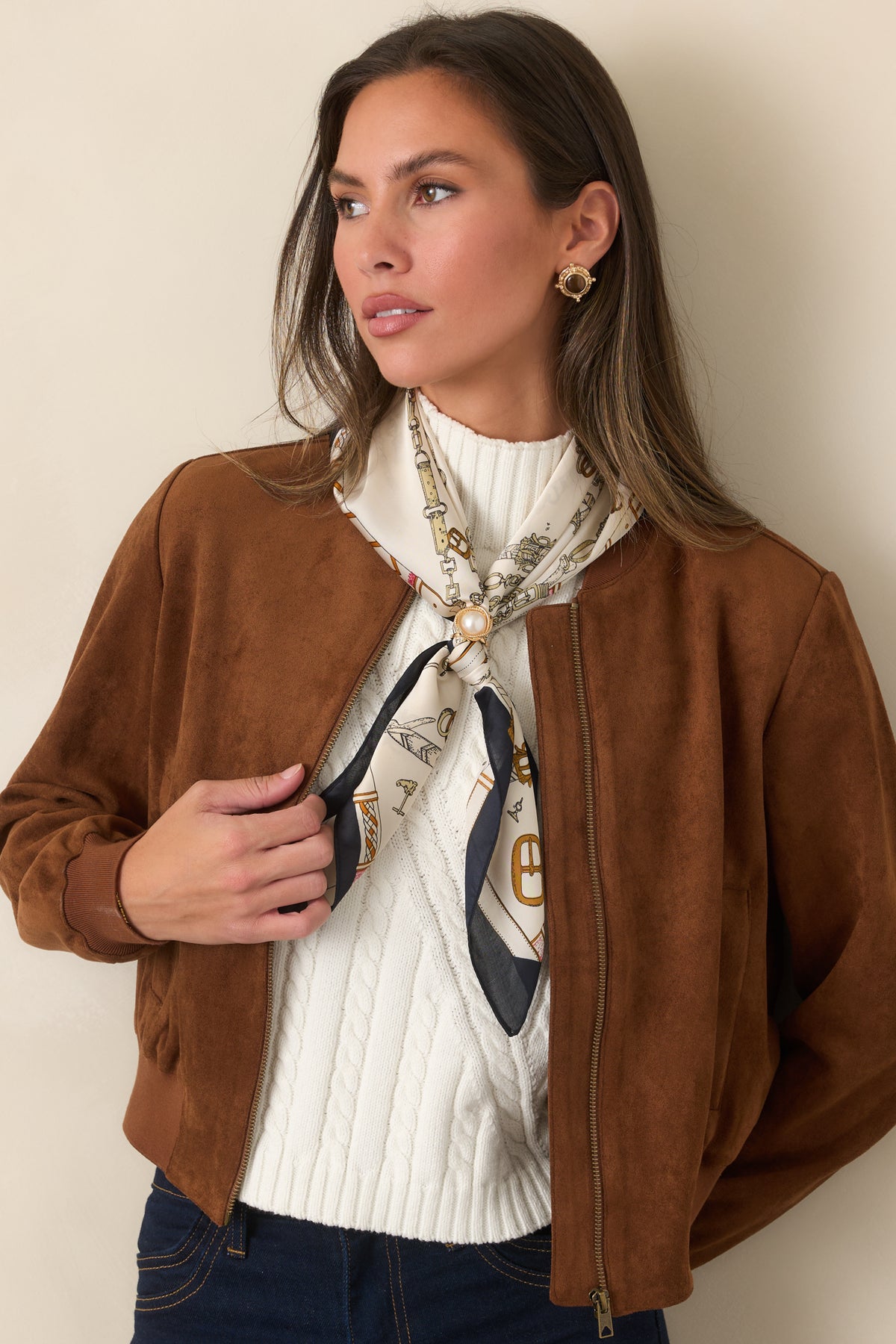 Sporty ribbed trim frames the relaxed cognac faux suede jacket, creating a polished finish with comfortable layering in mind.