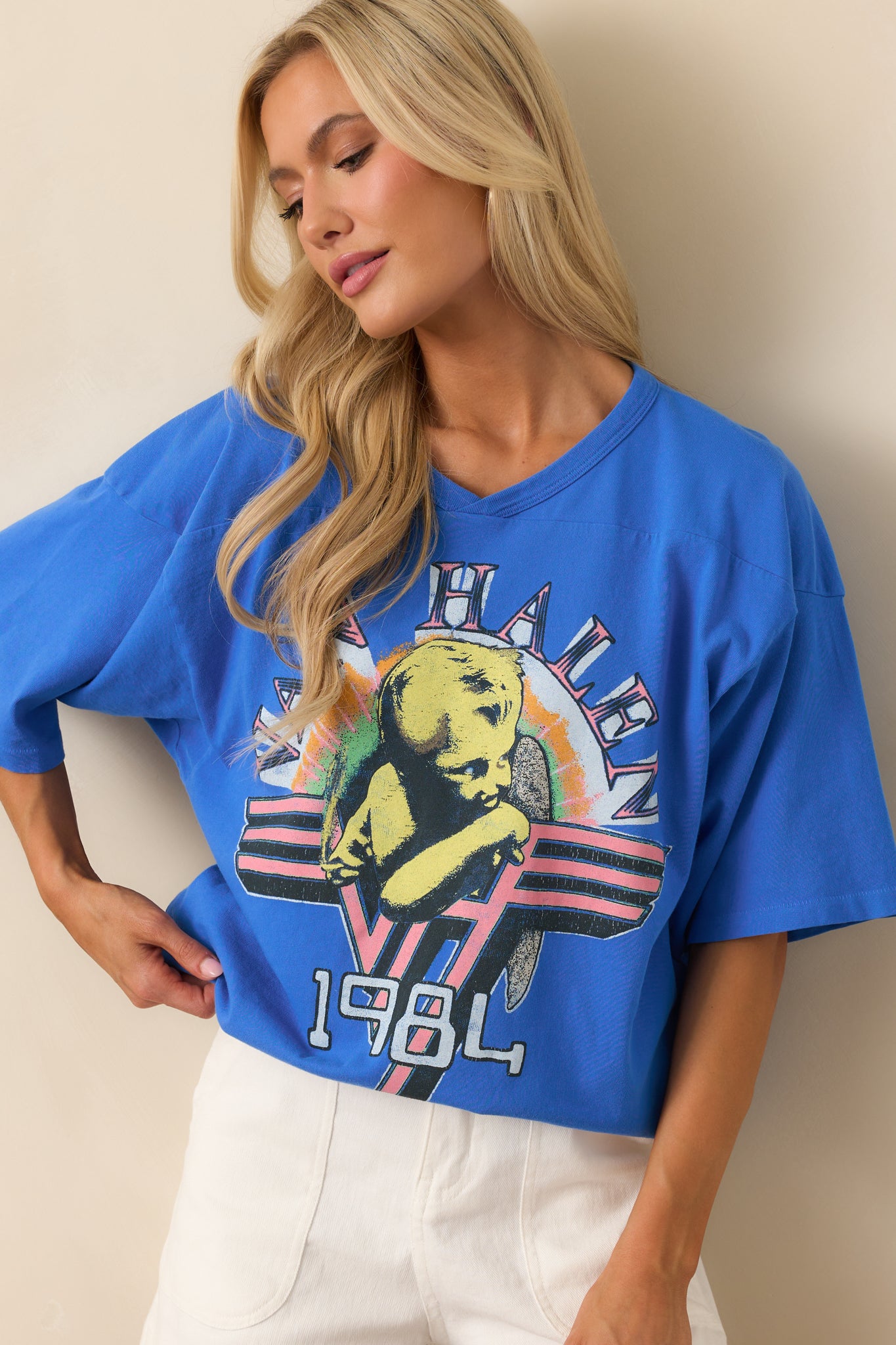 Cobalt blue tee with "Van Halen 1984" graphic shown in a relaxed, full-length front view emphasizing its oversized fit.