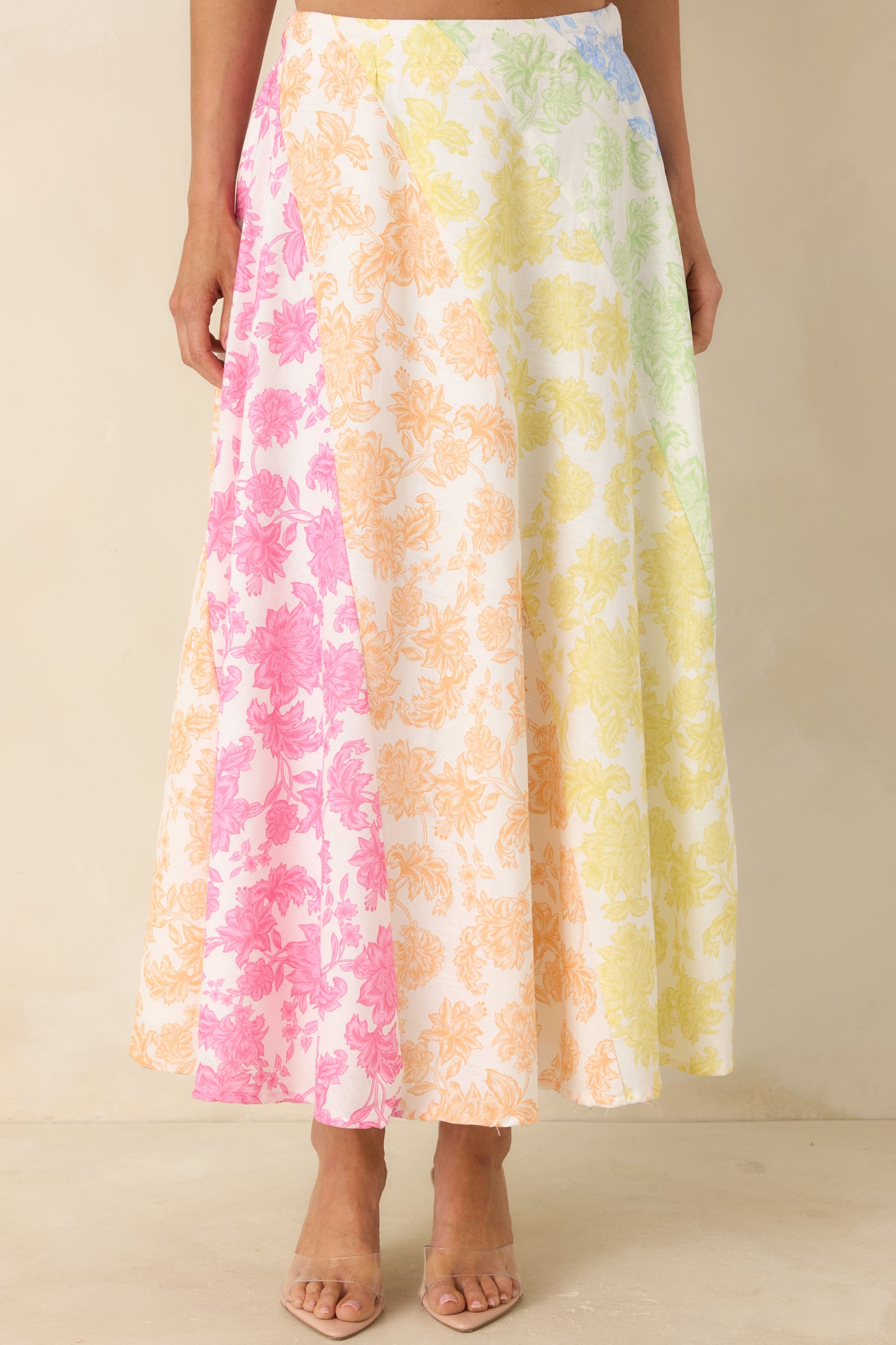 Color-block floral print detail showing softly blended multi-color panels and lightweight texture.