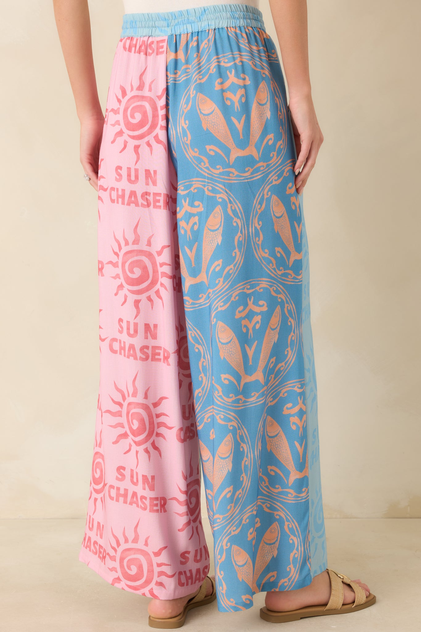 Back view of the colorblock wide leg pants featuring the printed design and relaxed silhouette.