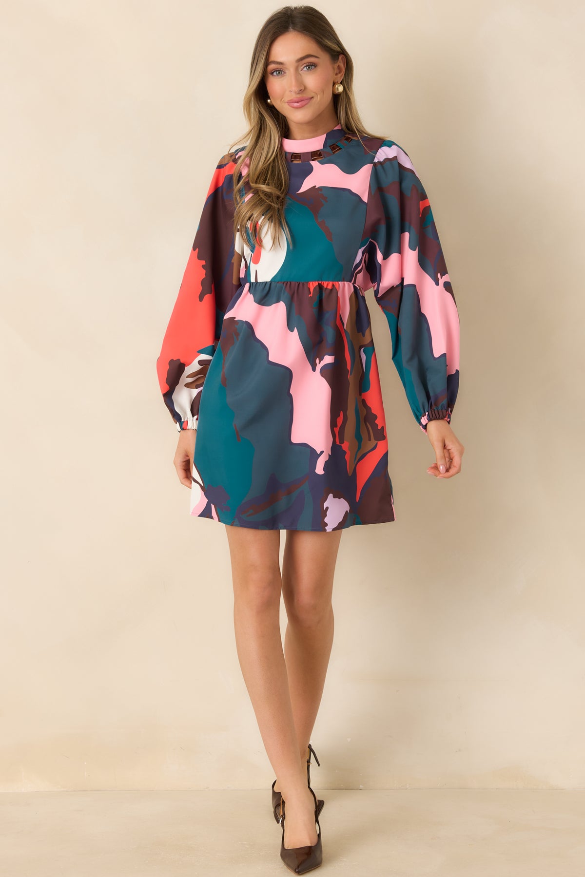 Colorful mini dress with a round neckline, gathered waist, elasticized balloon sleeve cuffs, and a flared skirt.