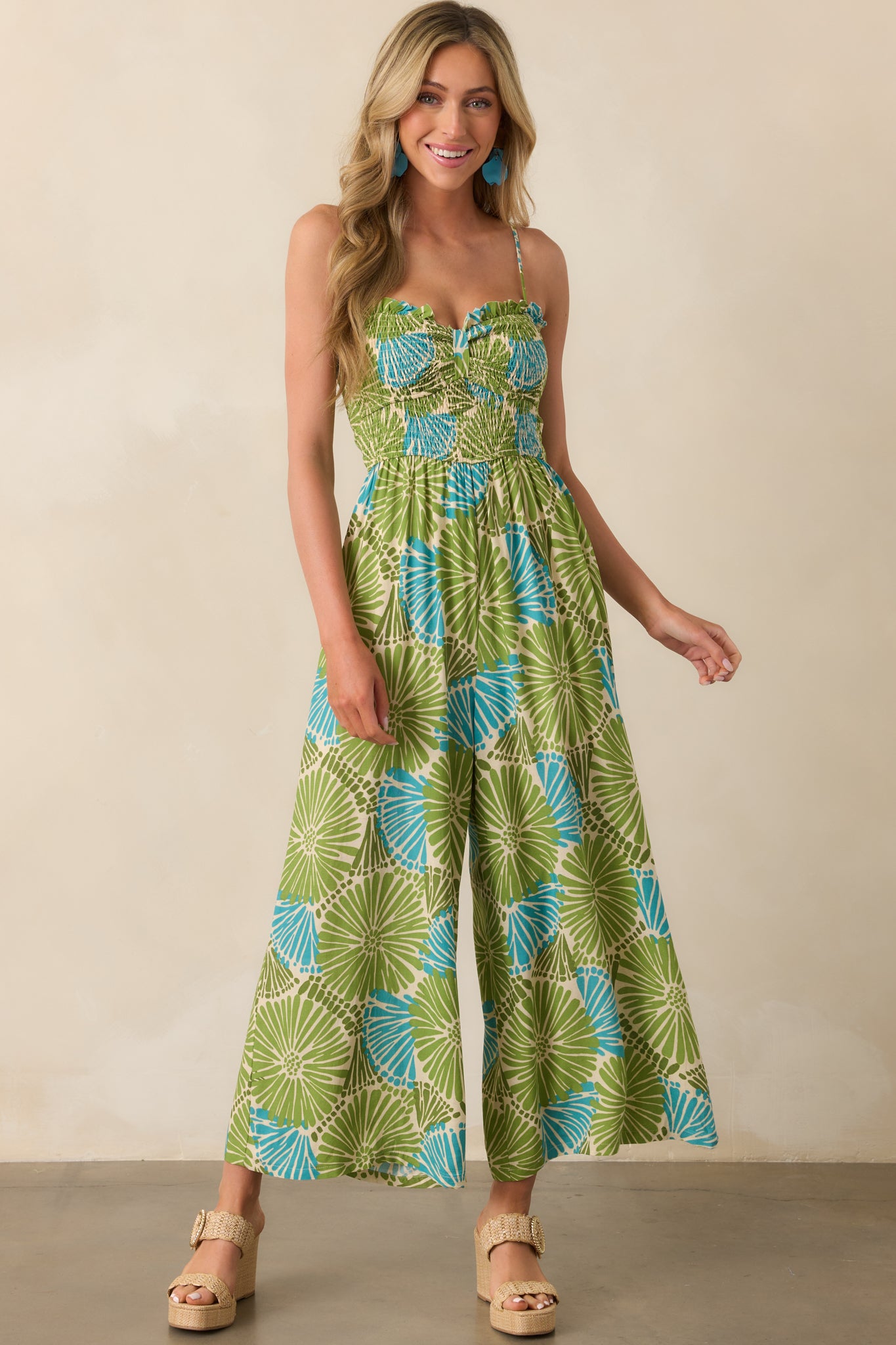 Complete outfit photo showing the cinched center bust detail and relaxed flow of the wide-leg jumpsuit.