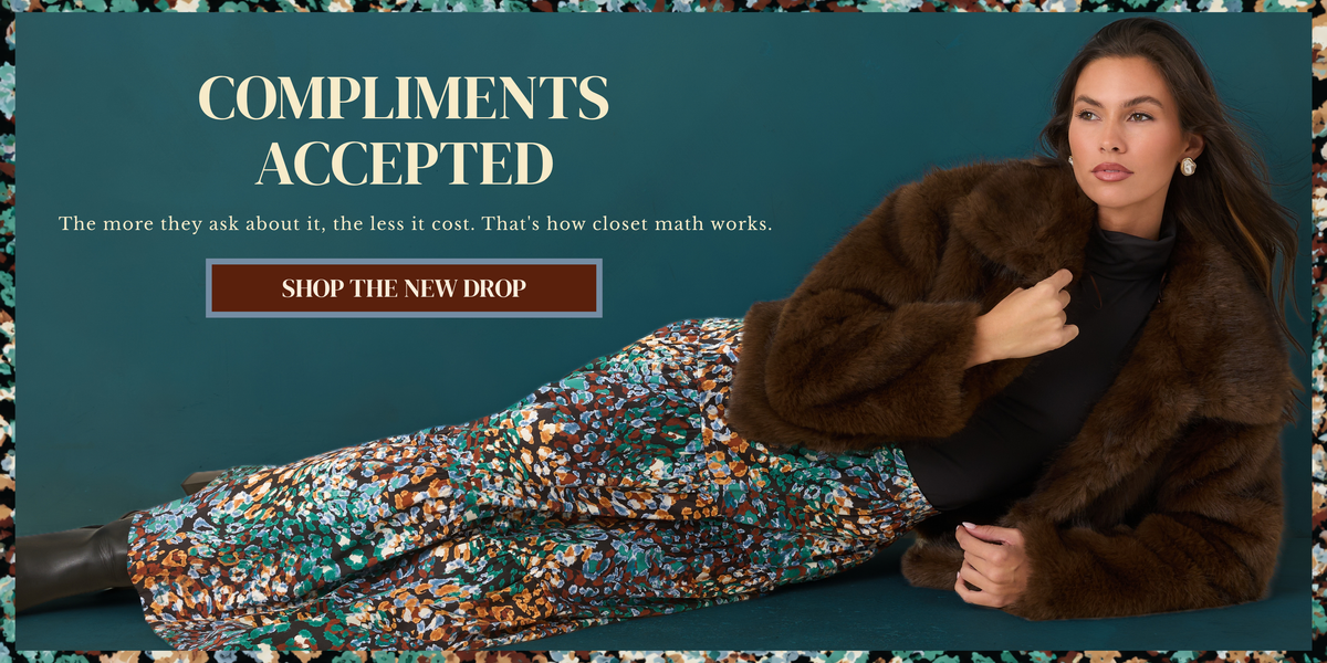 Model wearing a brown faux fur jacket and a teal multi-print skirt. Text reads: "Compliments Accepted: The more they ask about it, the less it cost. Shop the new drop."