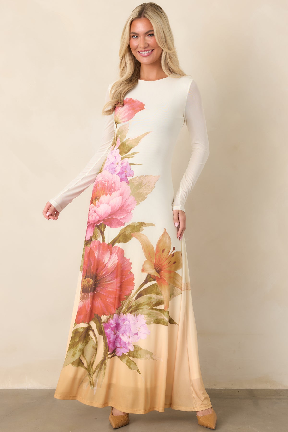 Floral maxi dress showcasing coral, pink, lavender, and peach tones.