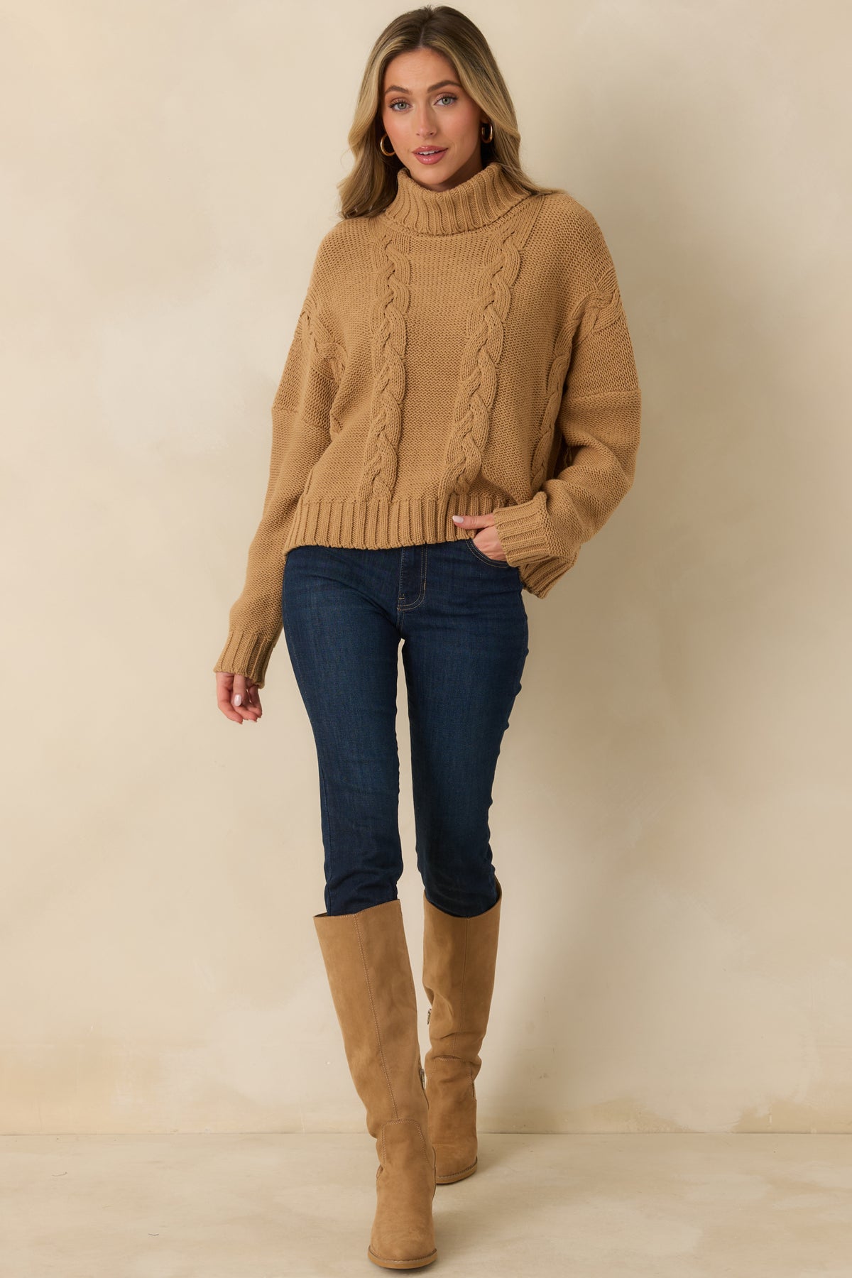 Cotton-blend cable knit sweater featuring a relaxed slightly oversized shape and long sleeves finished with ribbed cuffs.