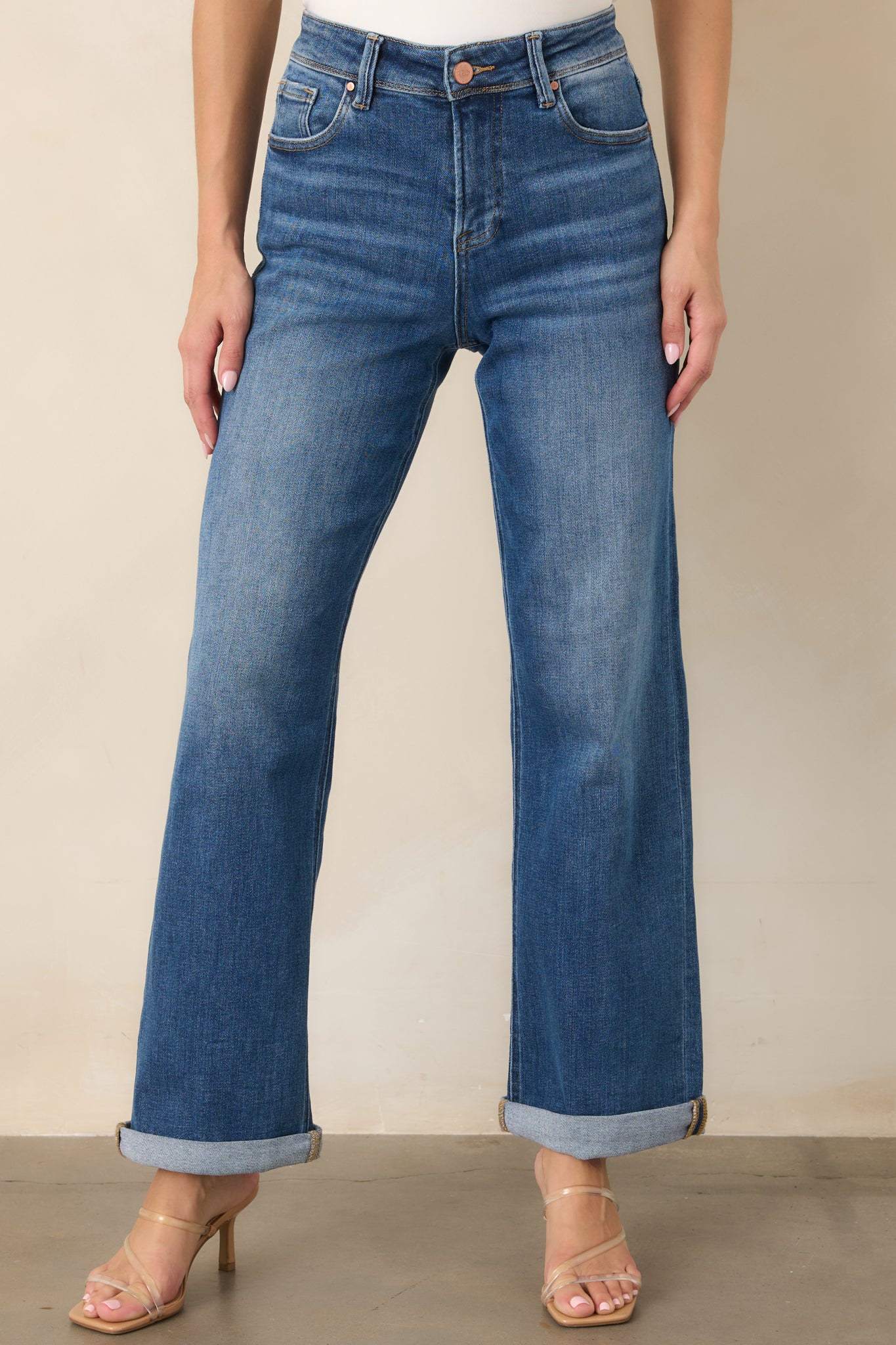 Detailed view of the cotton-blend denim showcasing subtle fading, smooth fabric texture, and neatly finished pocket stitching.
