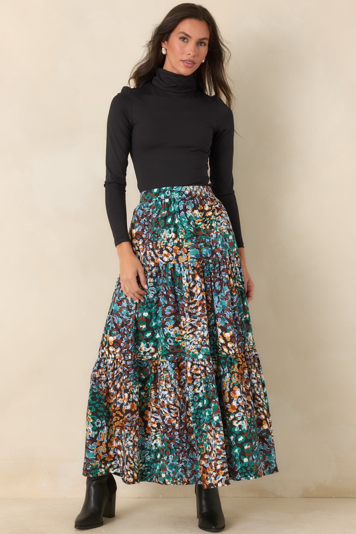 Cotton-blend skirt with a high-rise waist and softly voluminous tiered design.