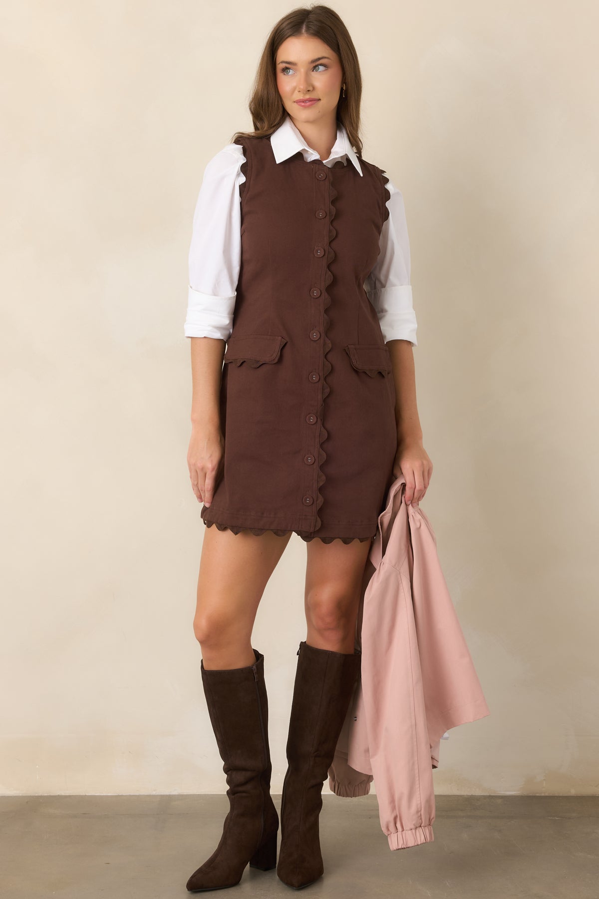 Fitted cotton-blend mini dress with tonal ric rac edging, covered buttons, shaped waist seams, and petite flap pockets.
