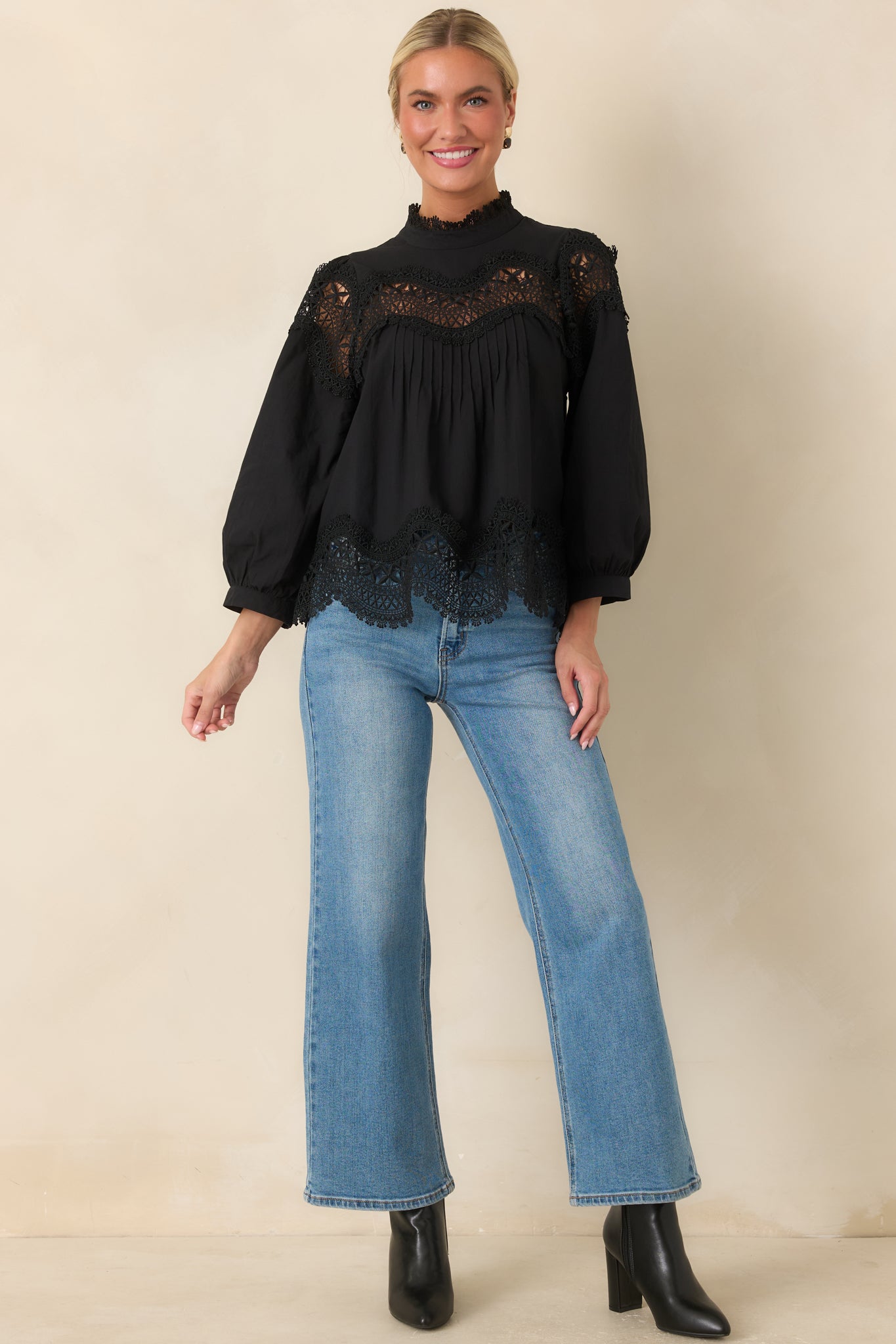 Cotton blouse showcasing a scalloped openwork yoke, textured front pintucks, and delicate lace trim.