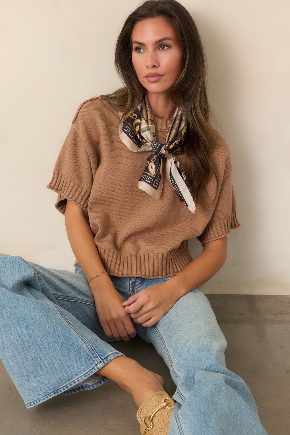Cotton top featuring a slightly boxy silhouette, short sleeves, and substantial ribbed edging throughout.
