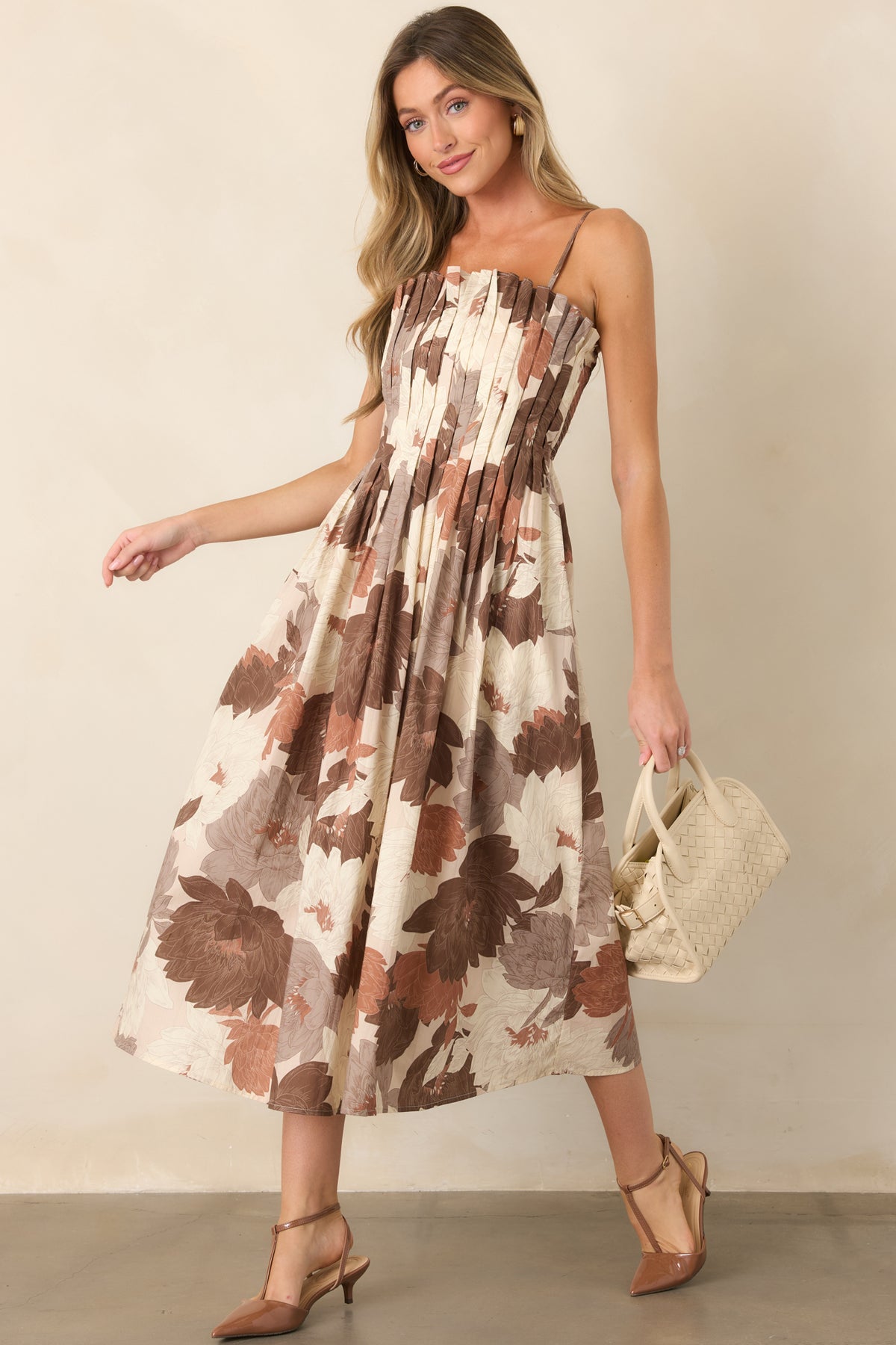 100% cotton floral midi dress in rich brown, rust, taupe, and ivory with a textured pleated bodice and full A-line skirt.