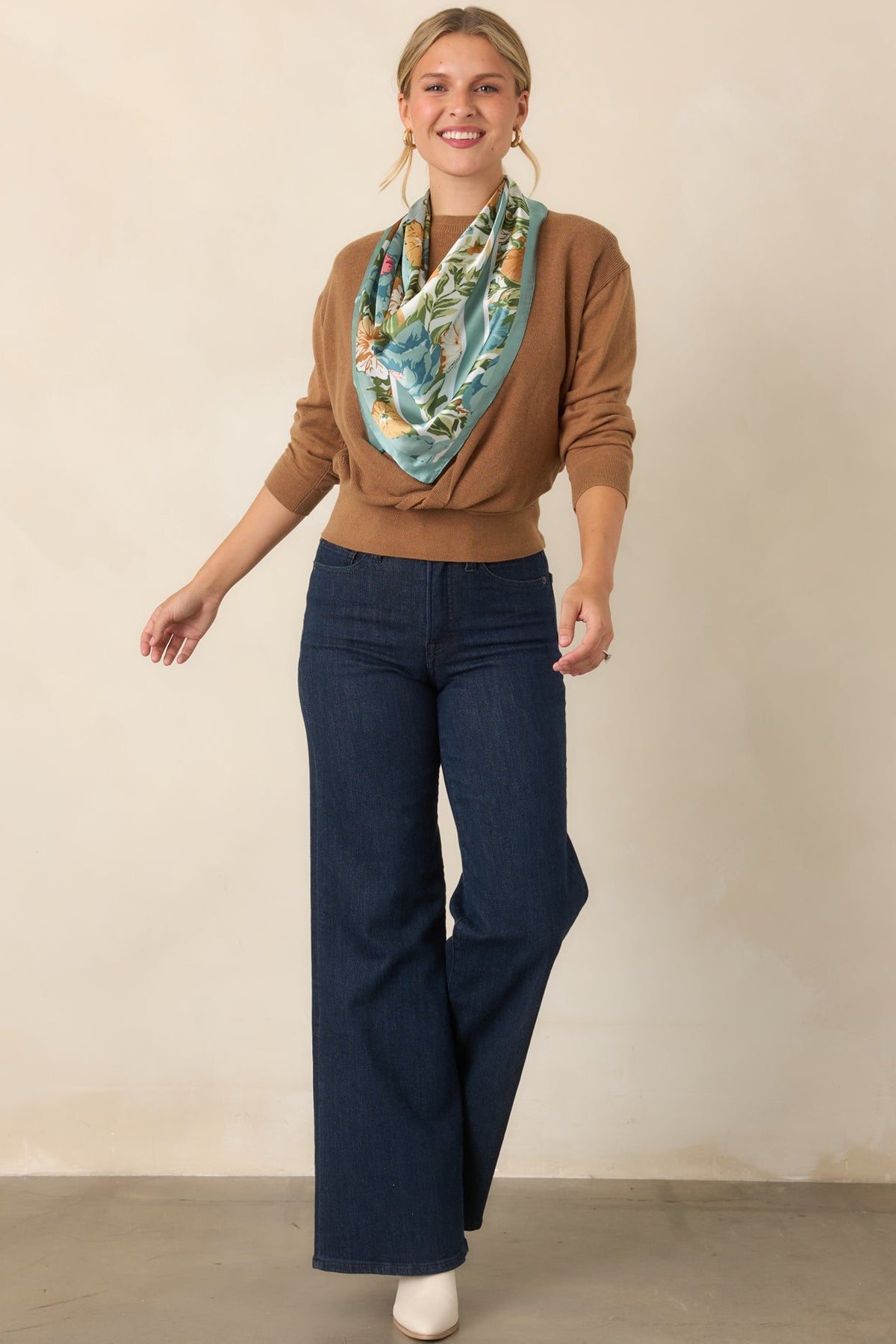 Cotton-and-cashmere knit top with a crewneck base, long-sleeve overlay, and softly structured silhouette.