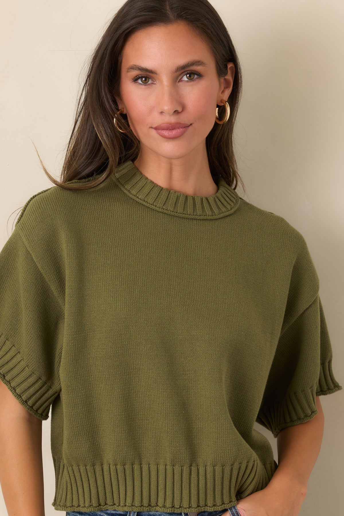 Short-sleeve cotton top with chunky ribbed edging at the crew neckline, cuffs, and hem.
