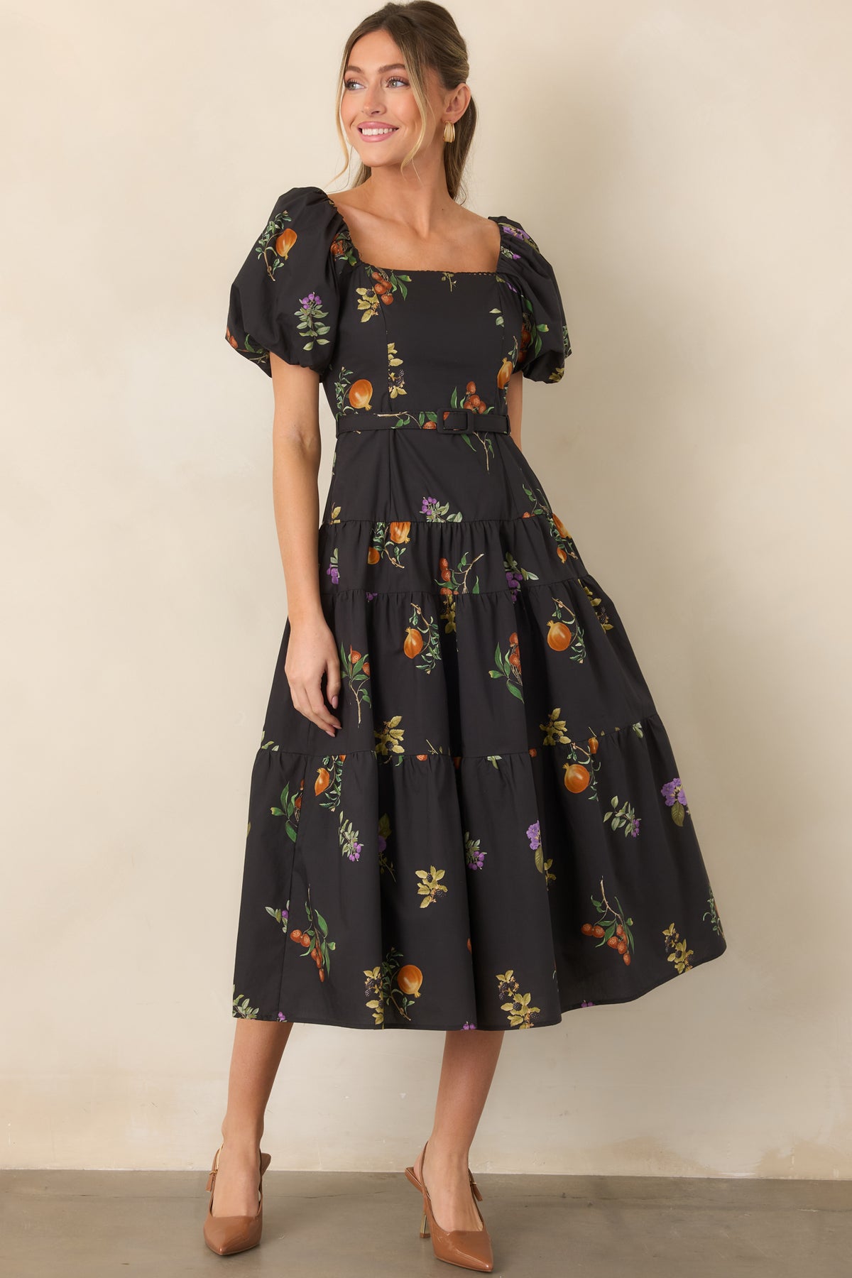 100% cotton dress with a defined waist, princess seams, voluminous puff sleeves, and a softly structured skirt.