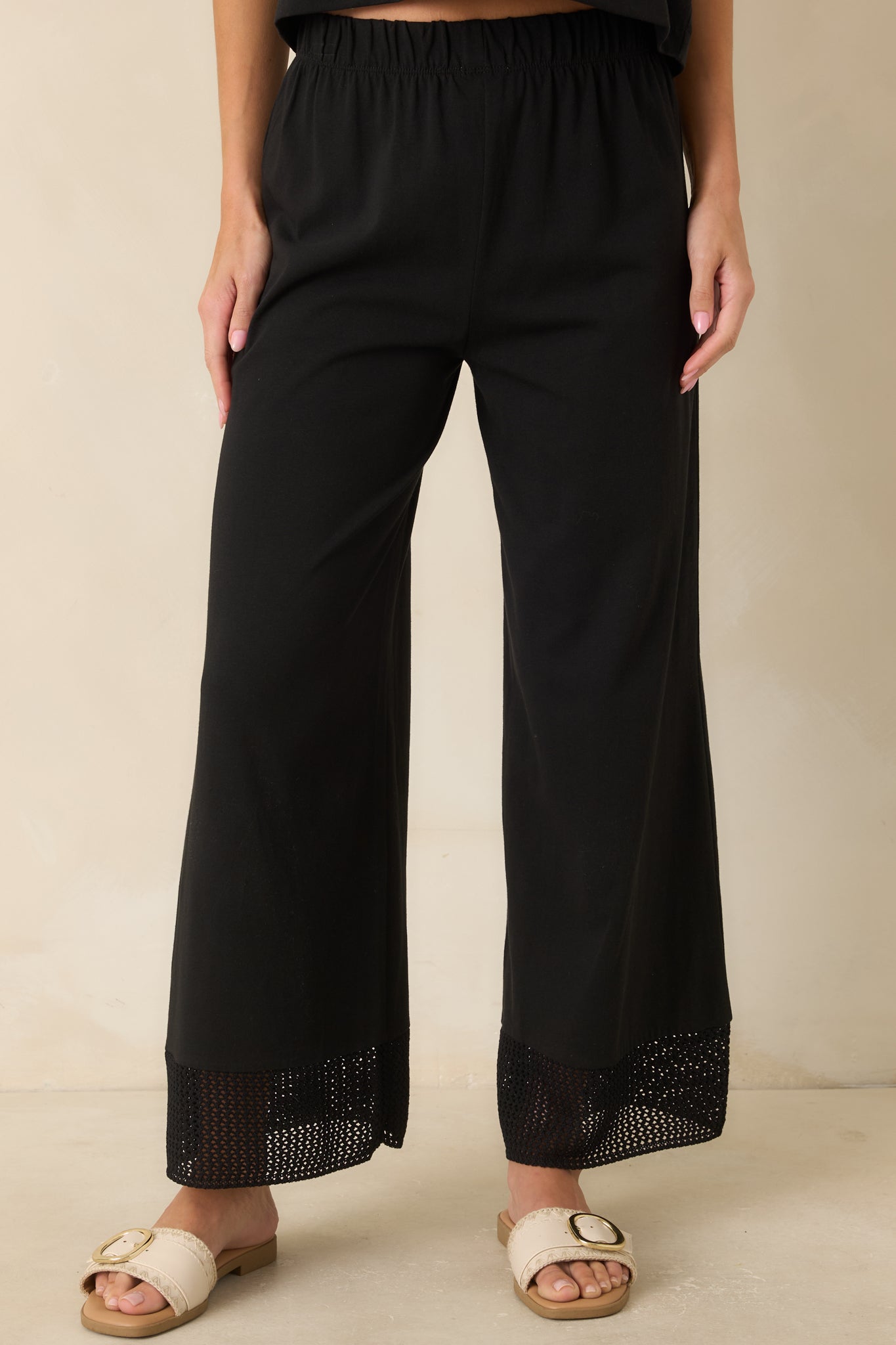 Soft cotton and lyocell jersey fabric creates a smooth, comfortable feel in these relaxed black pants.