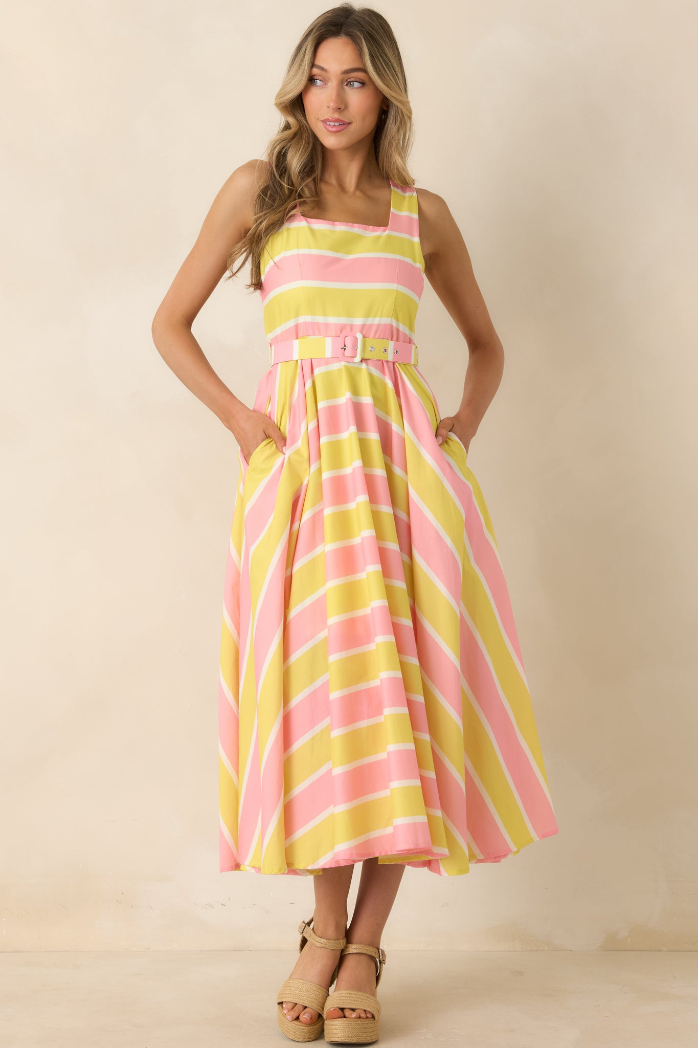 Cotton midi dress with vertical stripe detailing, removable belt, and full skirt.