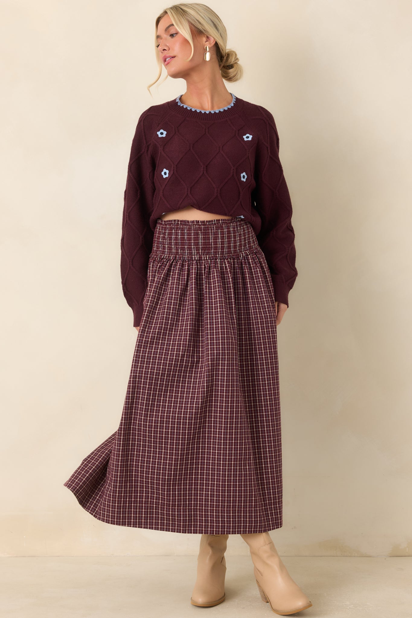 Cotton plaid maxi skirt featuring a comfortable smocked drop waist, soft ruffle waistband detail, and a voluminous gathered design.