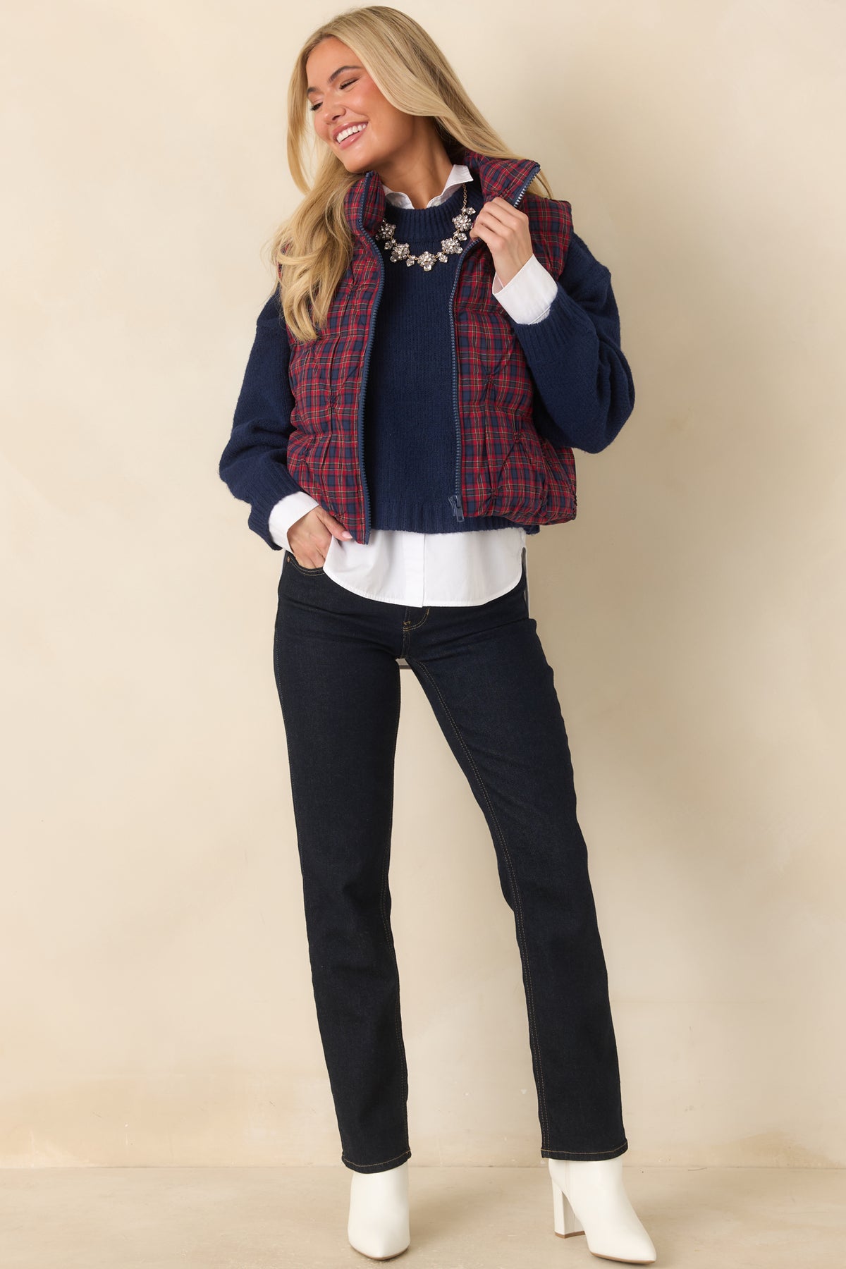 100% cotton plaid vest with a full-length navy zipper and softly rounded quilting.