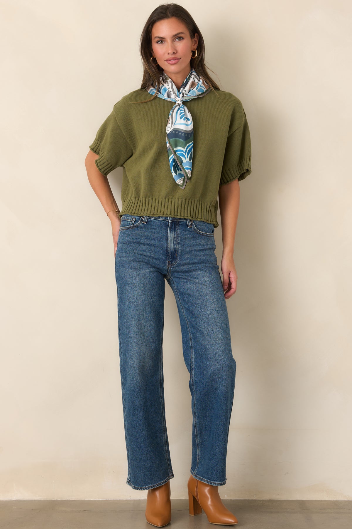 100% cotton top designed with relaxed short sleeves and a laid-back boxy shape.