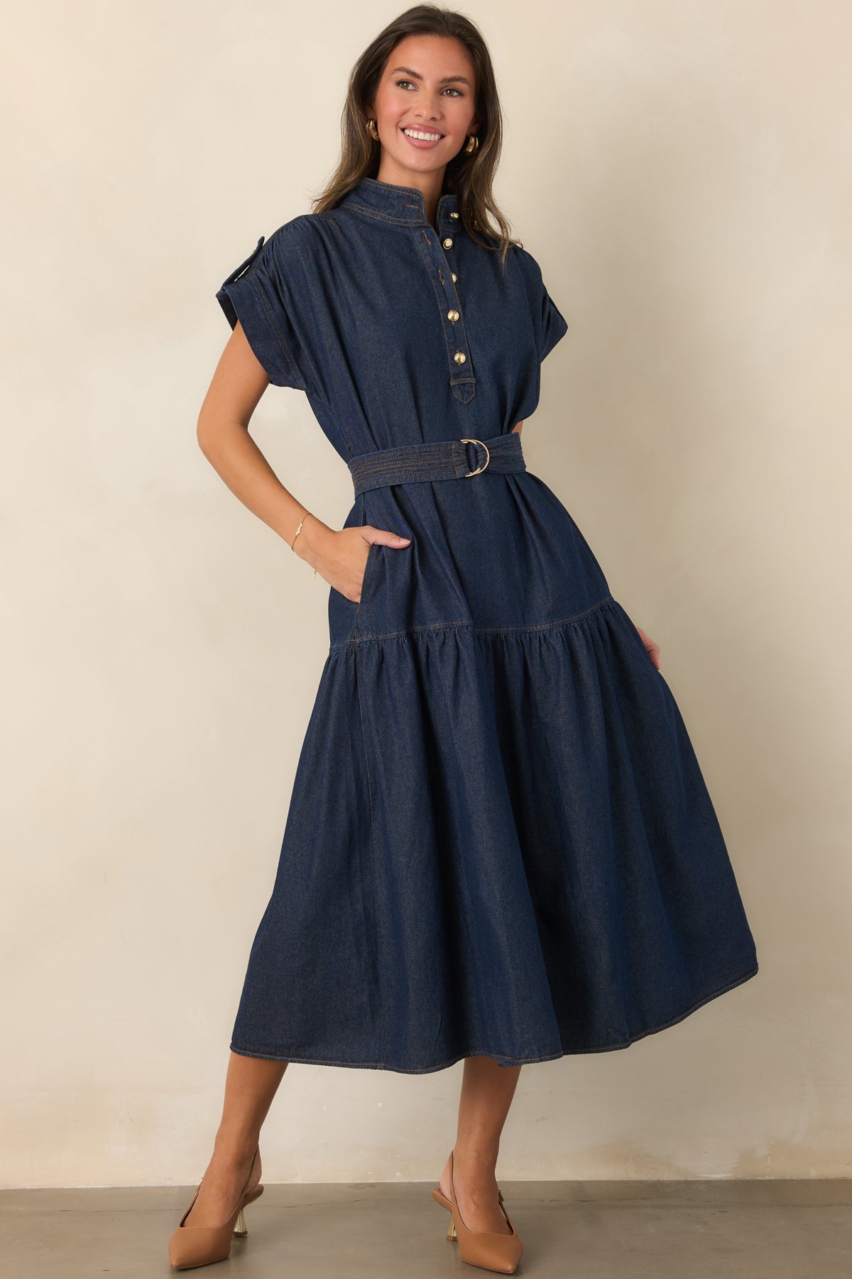 Cotton-rich dress highlighting the defined waist and voluminous gathered skirt.