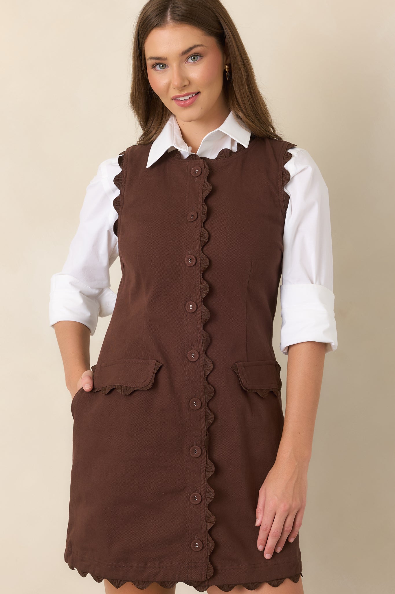 Shaping seams contour the waist of the cotton-rich mini dress, creating a defined and flattering silhouette.