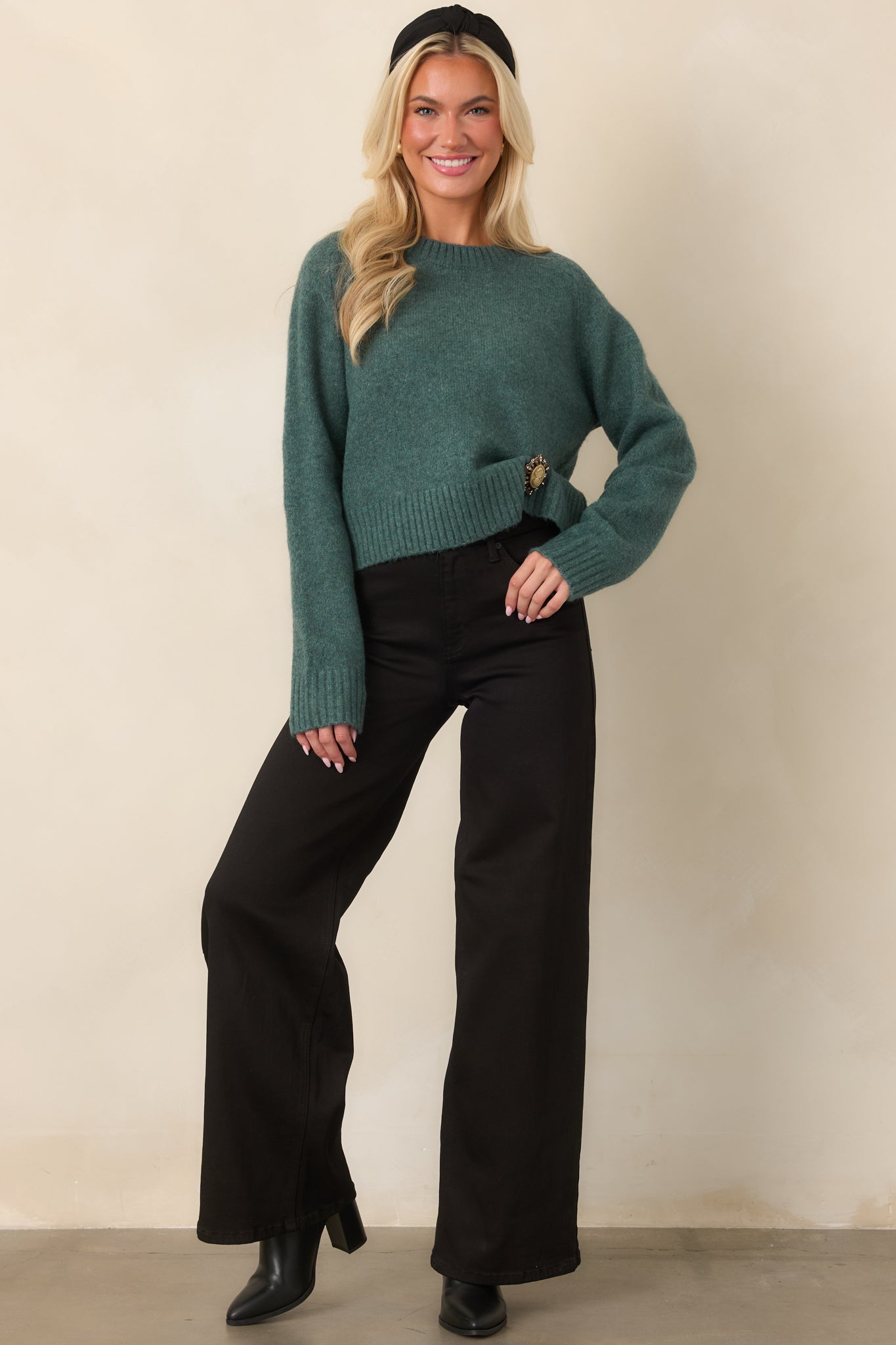 Cotton-rich stretch denim pants with belt loops, a structured waistband, and a relaxed full wide-leg silhouette.