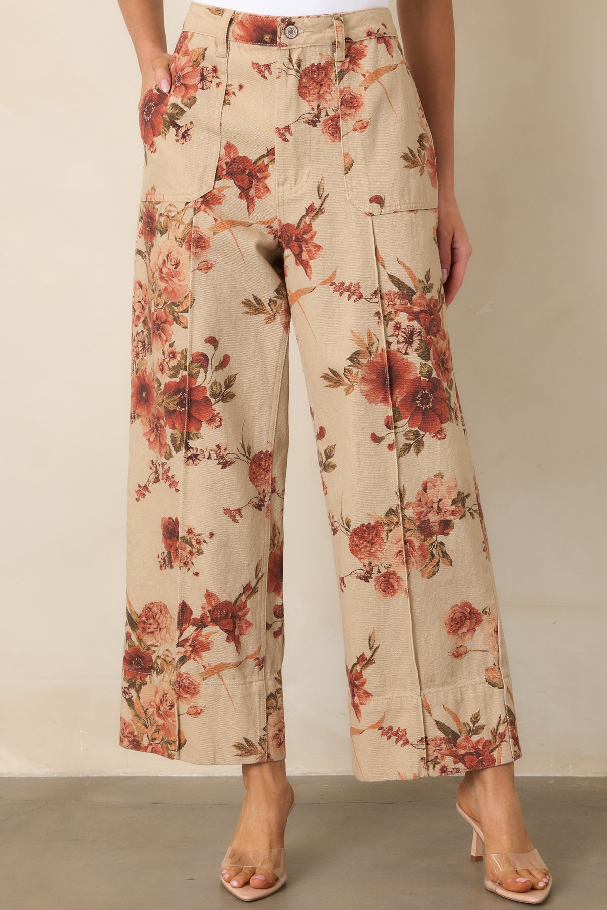 Cropped wide-leg pants showcasing the structured cotton fabric, botanical print, and high-rise waist.