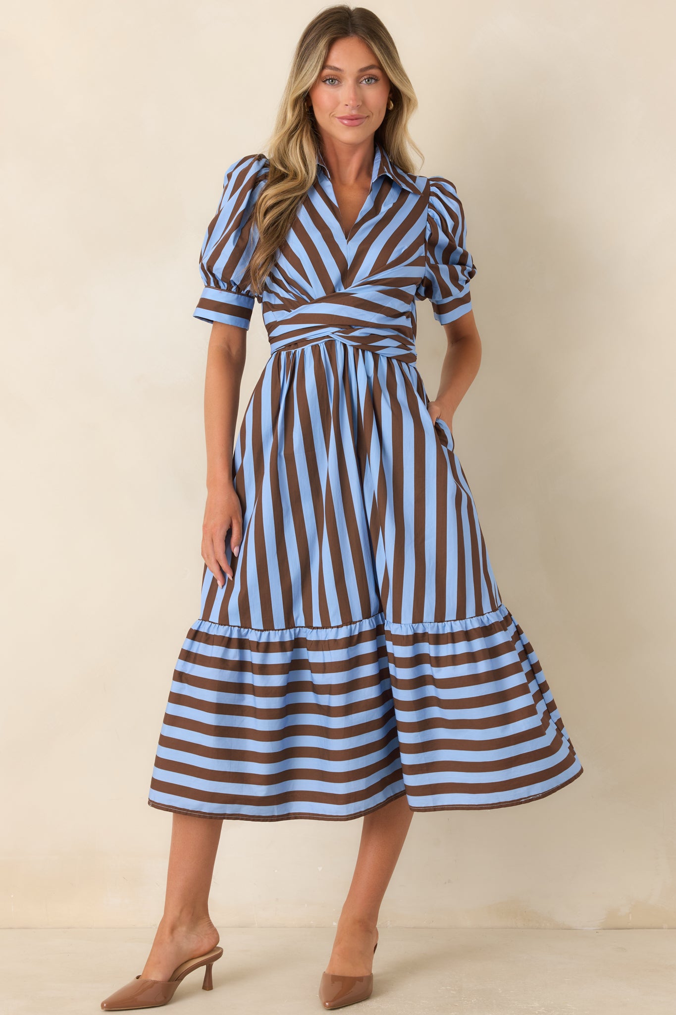 Cotton striped midi dress featuring a collared V-neckline, softly puffed short sleeves, and diagonal stripes across the bodice.