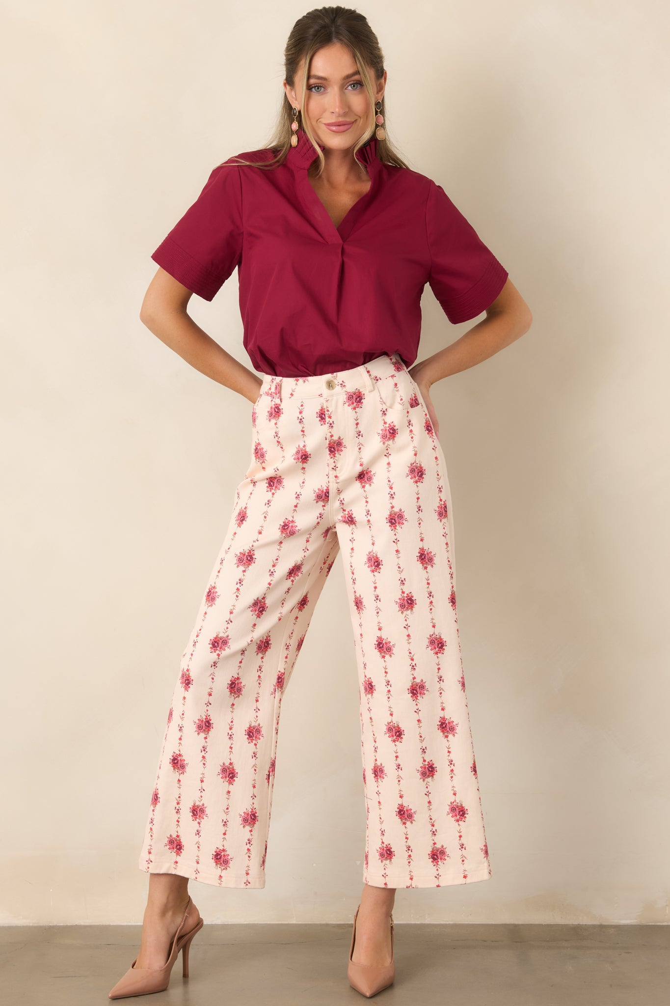 Breathable cotton top featuring a softly pleated ruffle collar, split neckline, short sleeves, and polished stitched cuff details.
