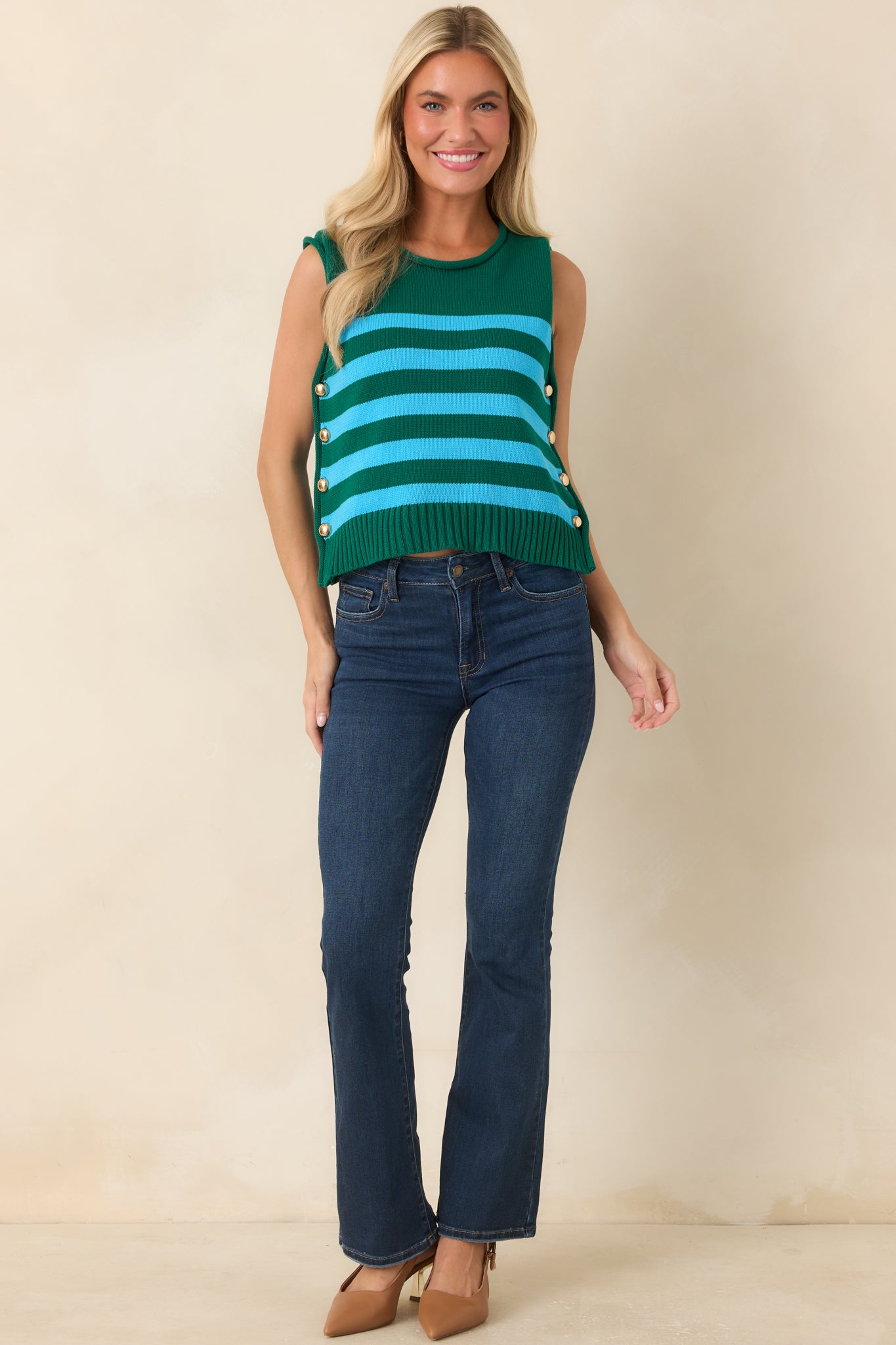 Cotton top featuring bold aqua stripes on a rich green base, round neckline, and gold-tone side buttons.